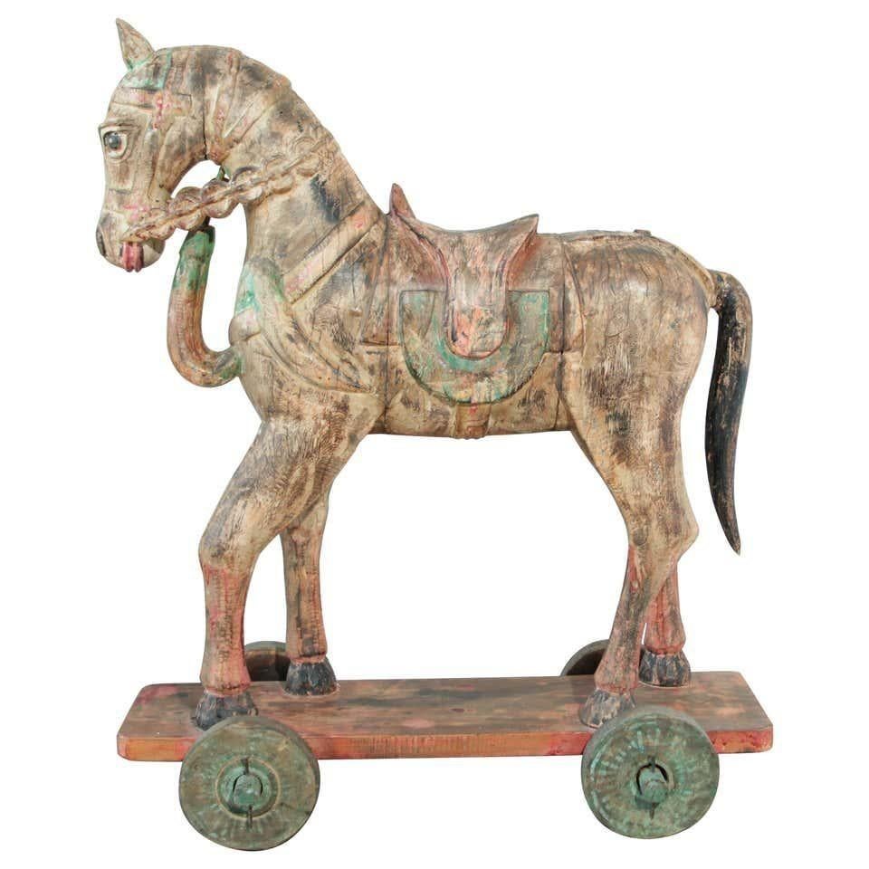 Antique Southeast Asian Polychrome Wooden Oversized Temple Horse from India.
Large Antique Southeast Asian Carved Polychrome Wood Horses.
Antique Southeast Asian carved wood model of a parade horse.
the body with allover polychrome, saddle and reins