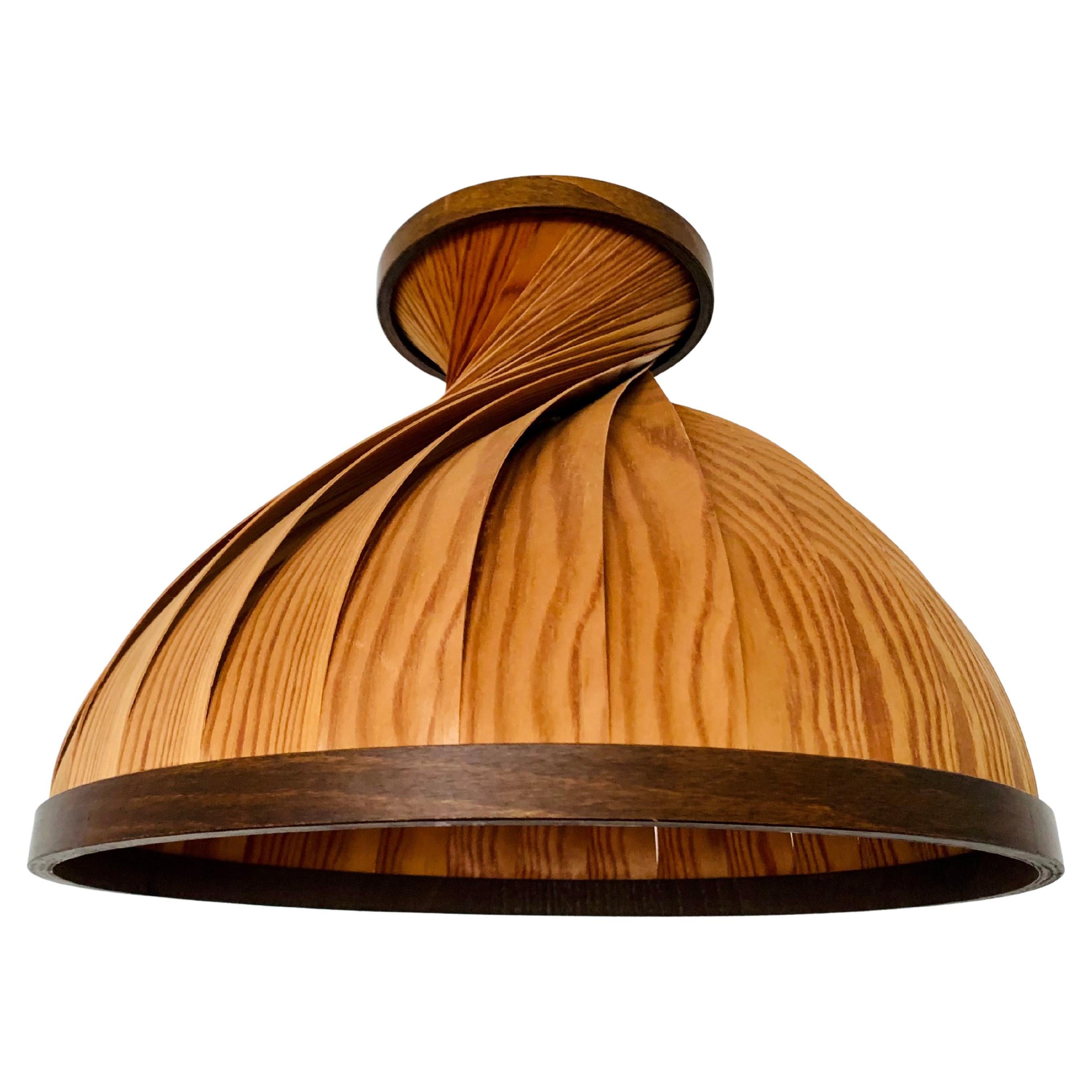 Lampada a sospensione in legno