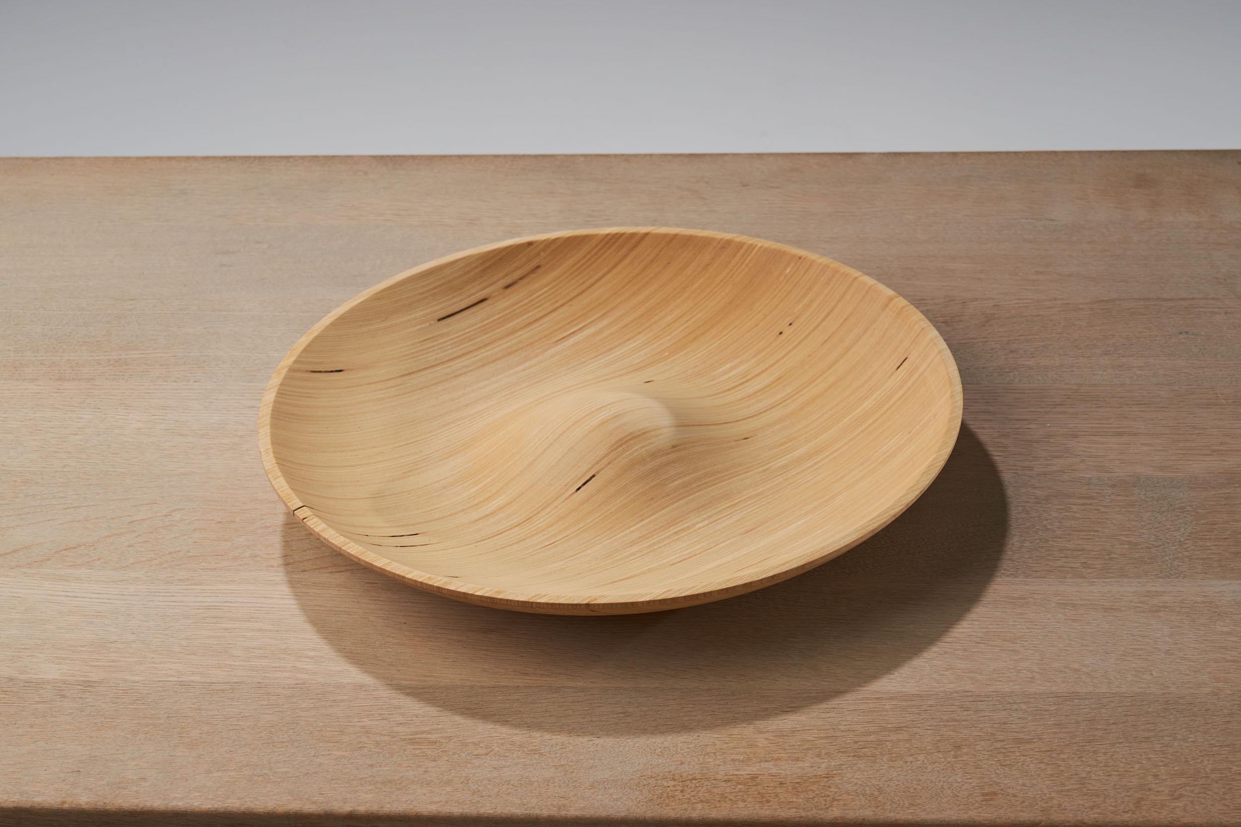 The design of products can relay various insights about the society and culture in which they have been produced. This set of four plates by Finnish industrial designer Antti Nurmesniemi is a great example of this. 

Finnish design is appreciated