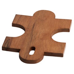 Wooden puzzle piece cutting board 11″