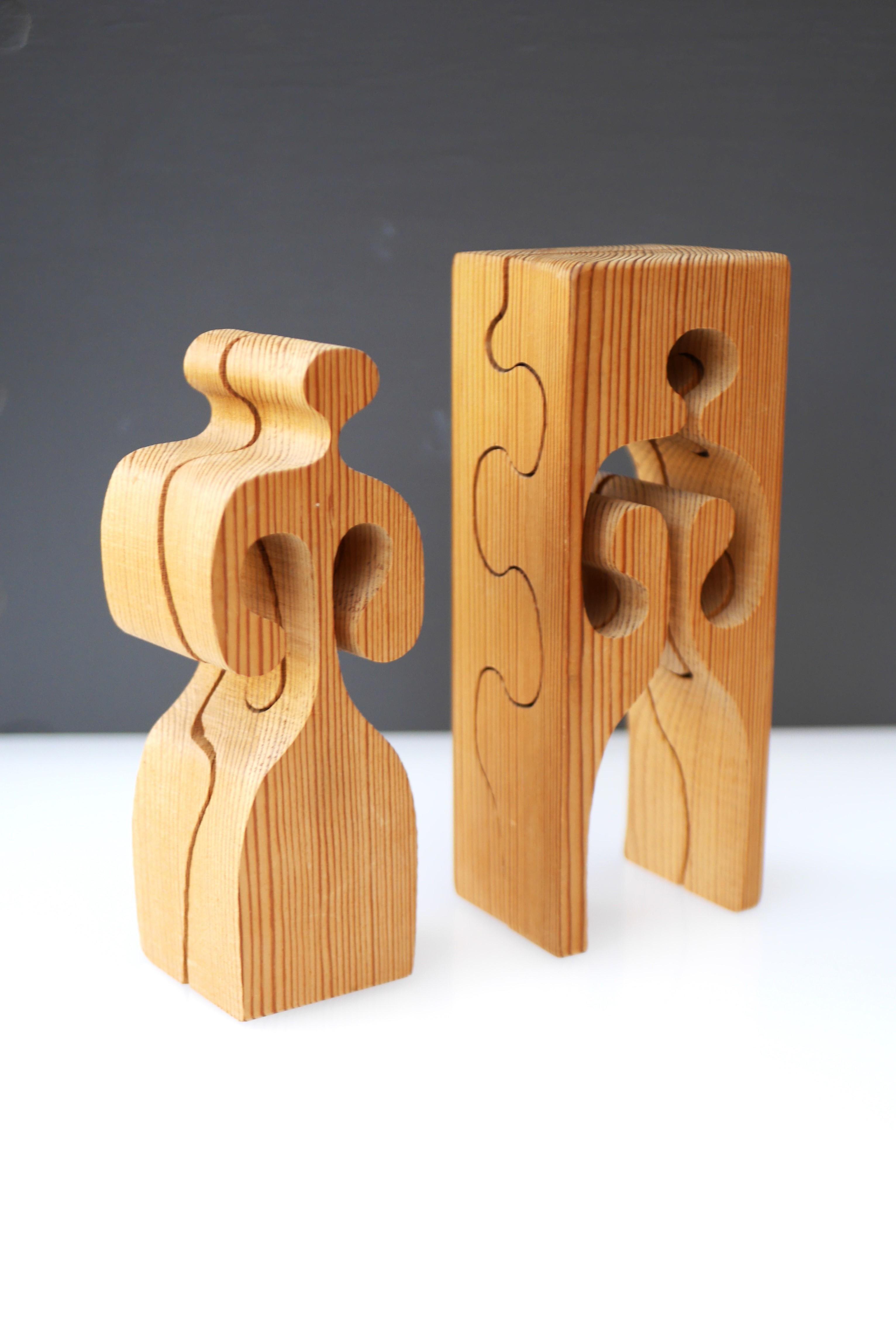 An exceptional and rare vintage Swedish Mid-century modern handmade figurative abstract puzzle/sculpture. It is made of individual 4 pieces forming a block when assembled. Many combinations are possible for display. Made by Swedish artist Gunnar