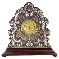 Wooden regulator clock with silver applications