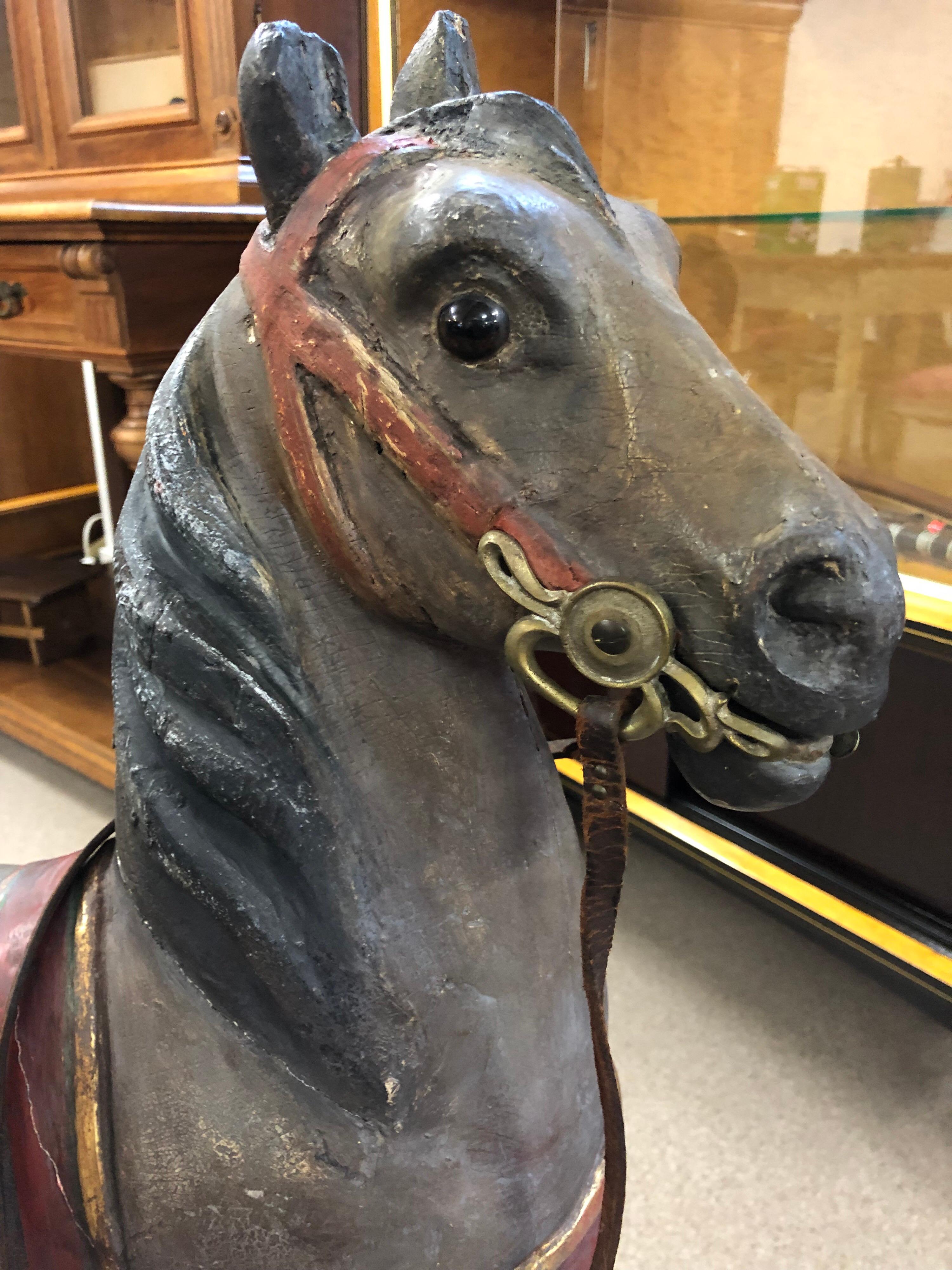 A rocking horse is a child's toy, usually shaped like a horse and mounted on rockers similar to a rocking chair. There are two sorts, the one where the horse part sits rigidly attached to a pair of curved rockers that are in contact with the ground,
