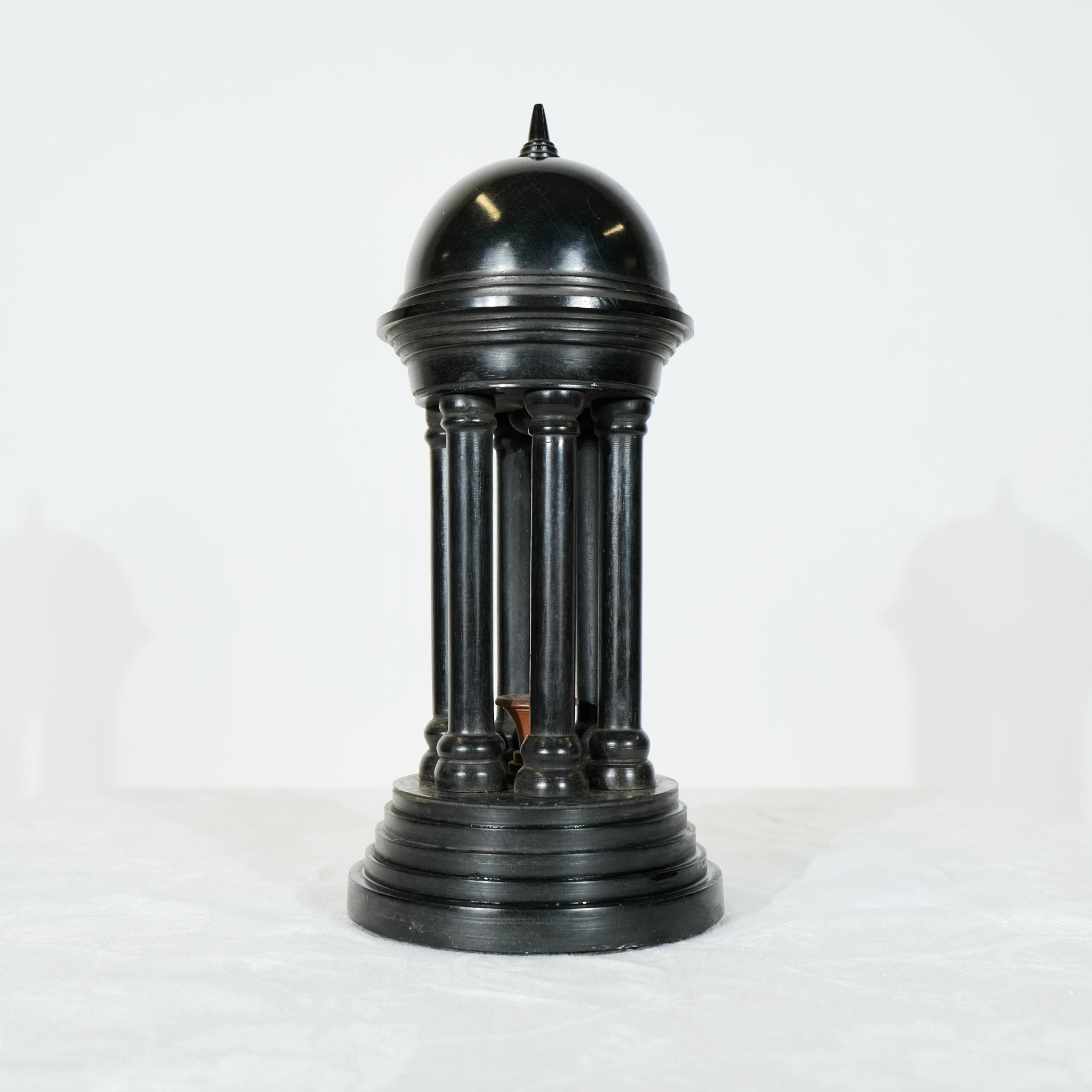 Grand Tour Roman Temple Souvenir – A Timeless Masterpiece in Blackened Wood.
 Transport yourself to the grandeur of classical antiquity with this exquisite Grand Tour Roman Temple Souvenir from the 19th c.
An elegant tribute to the architectural