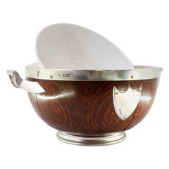 Wooden salad bowl with silver accents, porcelain core 
beaded base