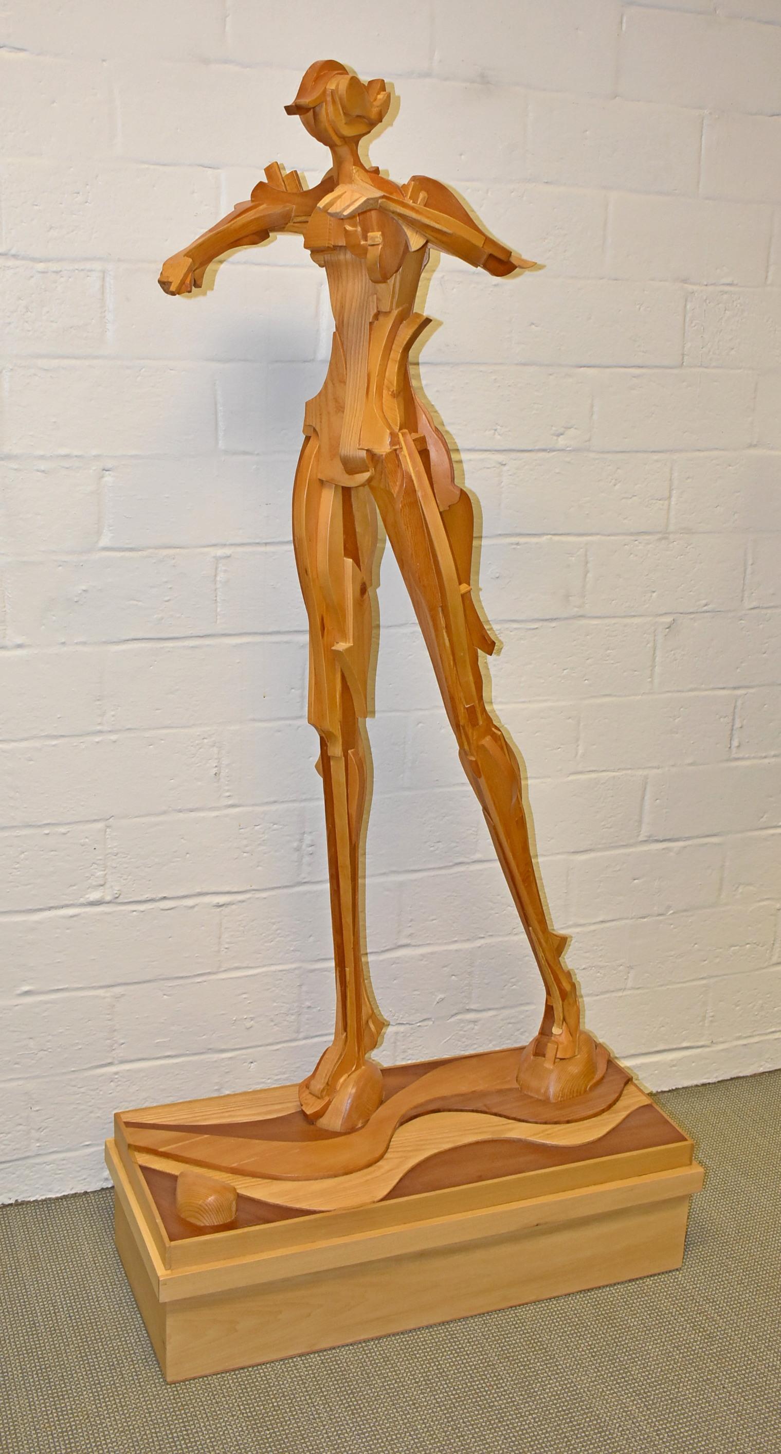 Wooden Sculpture by C. Harrison. 20th Century. Carol Harrison (b.1933) American, Cranbrook Academy of Art, is known for Postwar and Contemporary sculptures. Wooden sculpture of a woman in 3D form on a base, Signed C. Harrison. Great Vintage