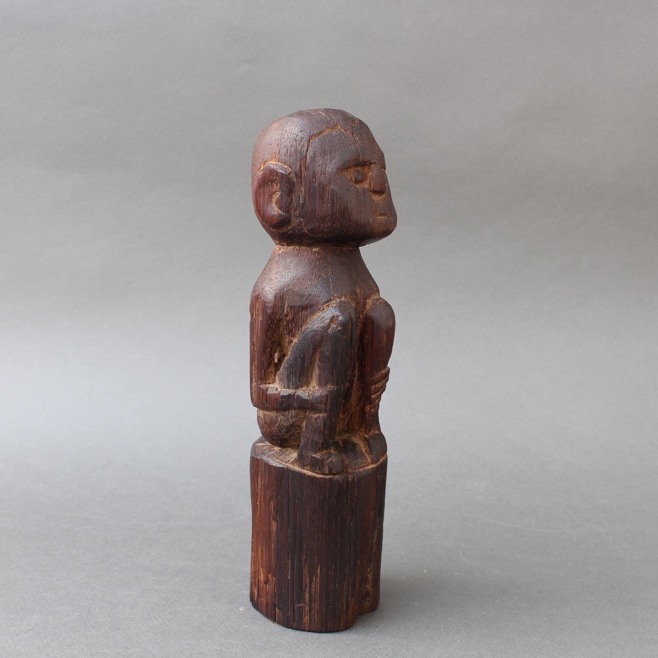 Indonesian Wooden Sculpture or Carving of Sitting Figure from Sumba Island, Indonesia