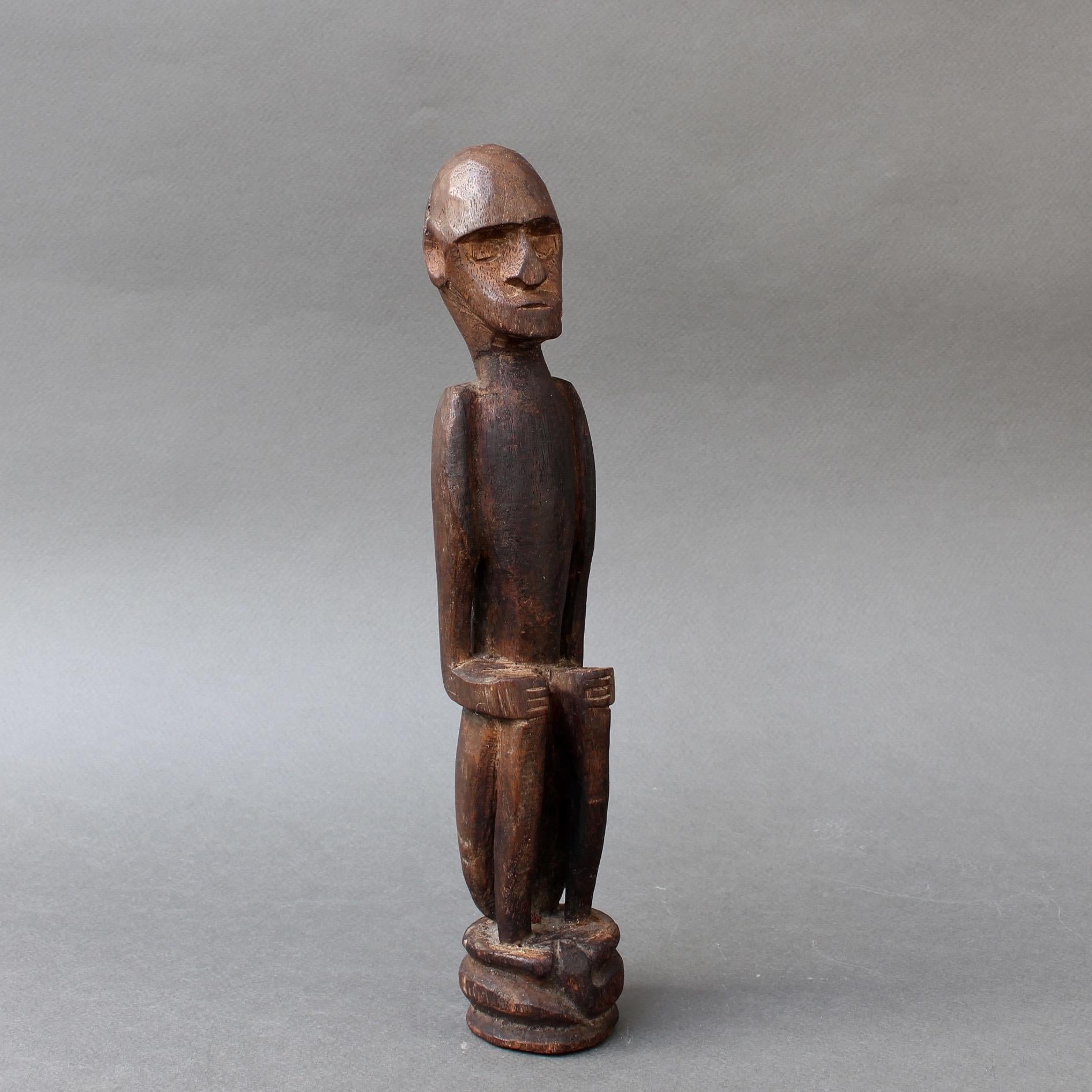 Indonesian Wooden Sculpture or Carving of Sitting Figure from Sumba Island, Indonesia