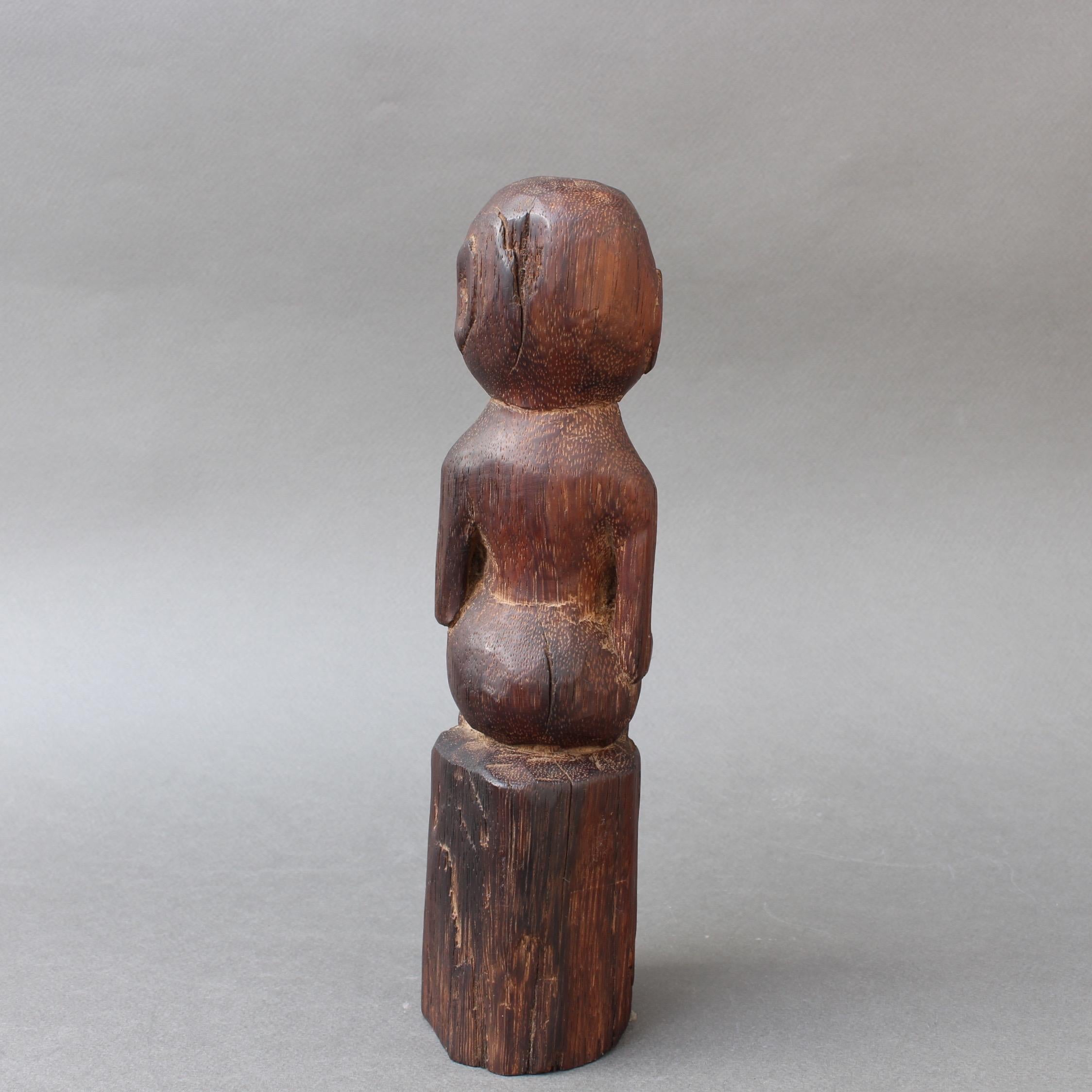 Wooden Sculpture or Carving of Sitting Figure from Sumba Island, Indonesia In Good Condition In London, GB