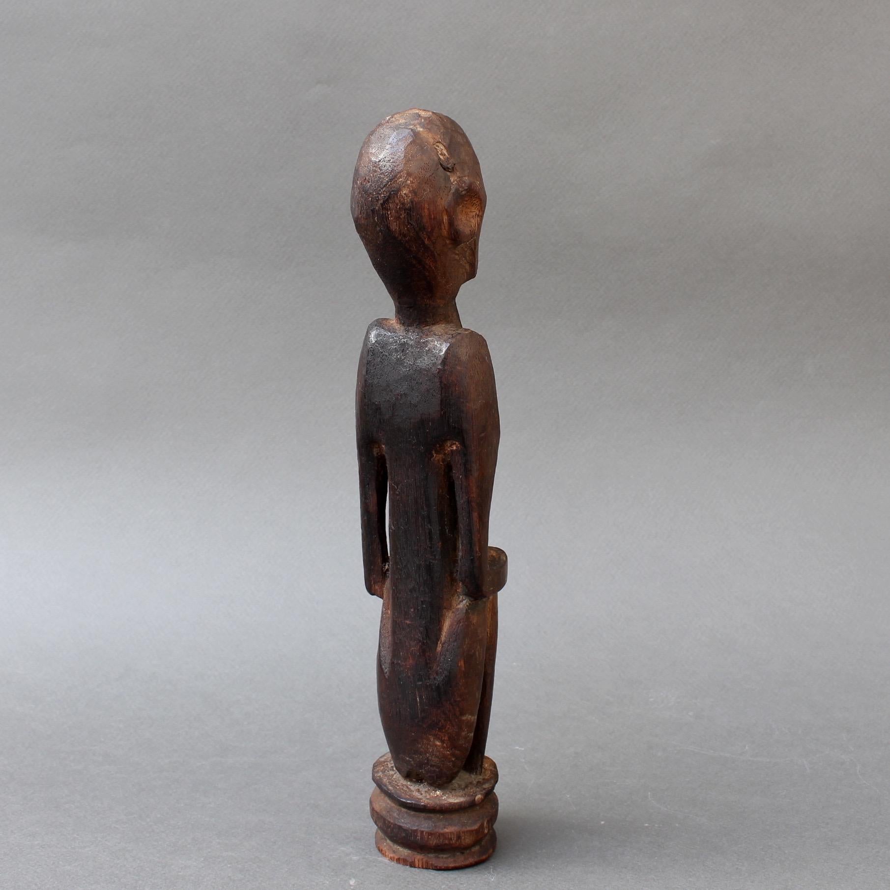 Wooden Sculpture or Carving of Sitting Figure from Sumba Island, Indonesia In Good Condition In London, GB
