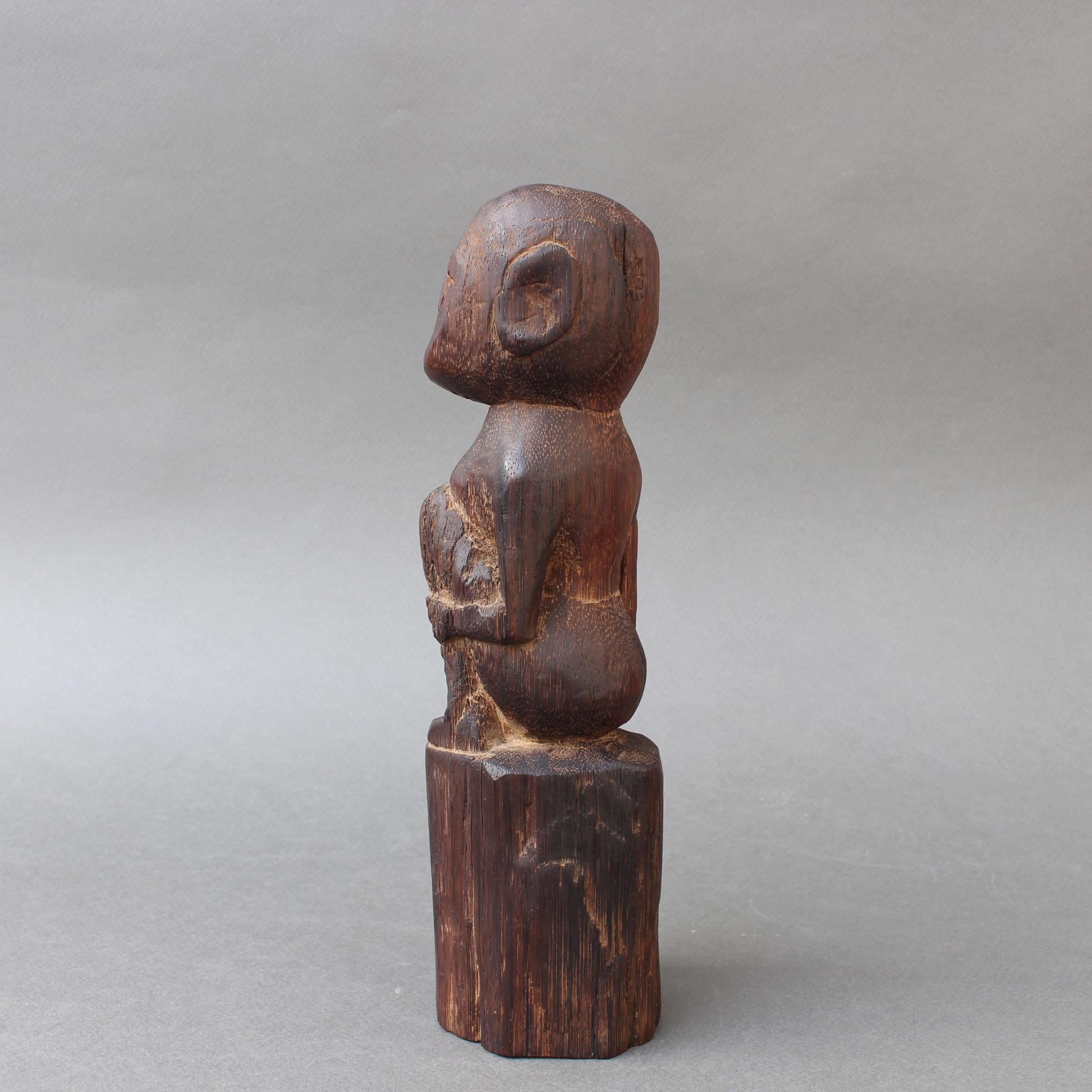 Late 20th Century Wooden Sculpture or Carving of Sitting Figure from Sumba Island, Indonesia