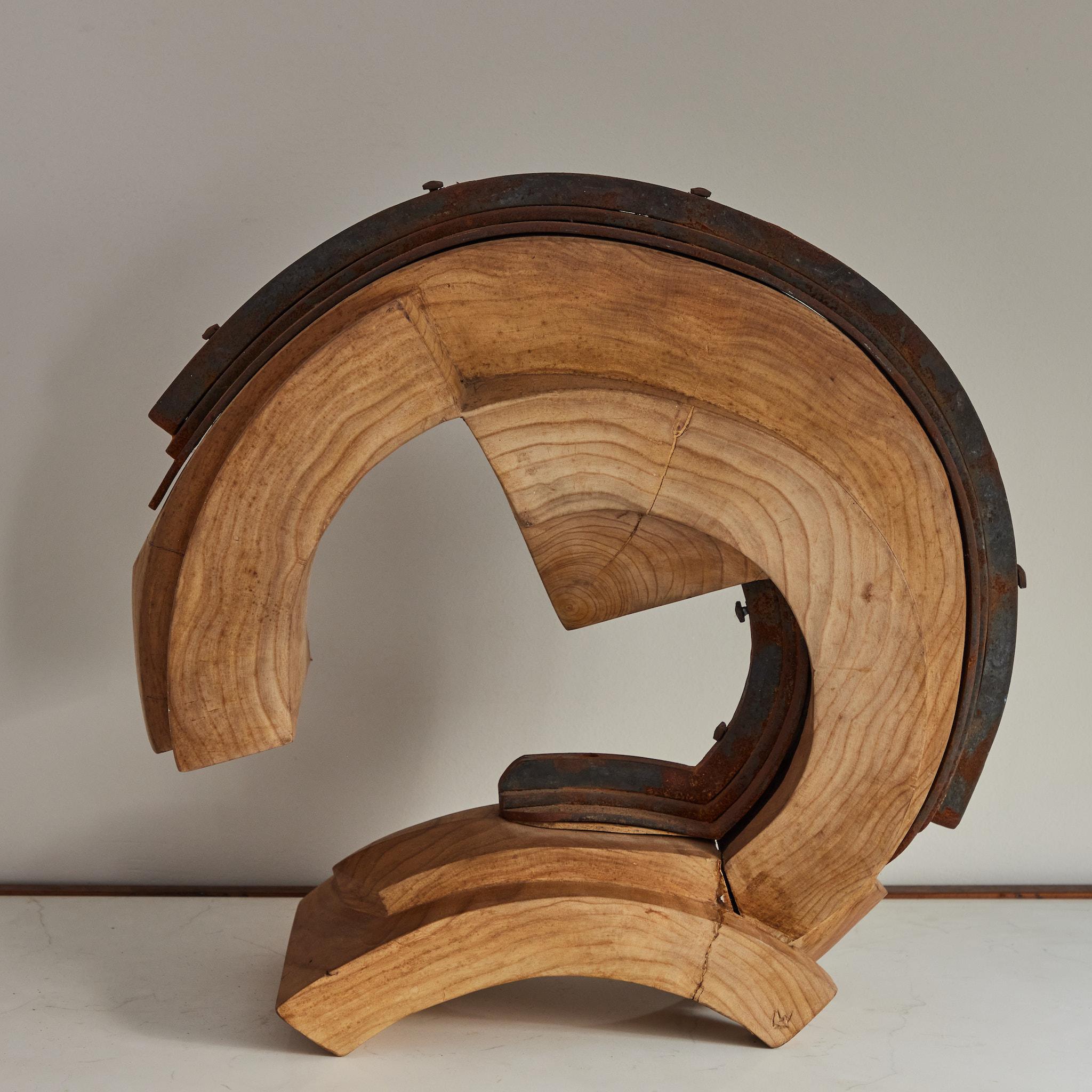 Carved raw wood sculpture from mid-century France. Celebrating the natural beauty of wood, this sculptural object has an organic yet industrial feel.  Blending softness and strength, the piece adds an earthy, modern accent to any decorative space. 

