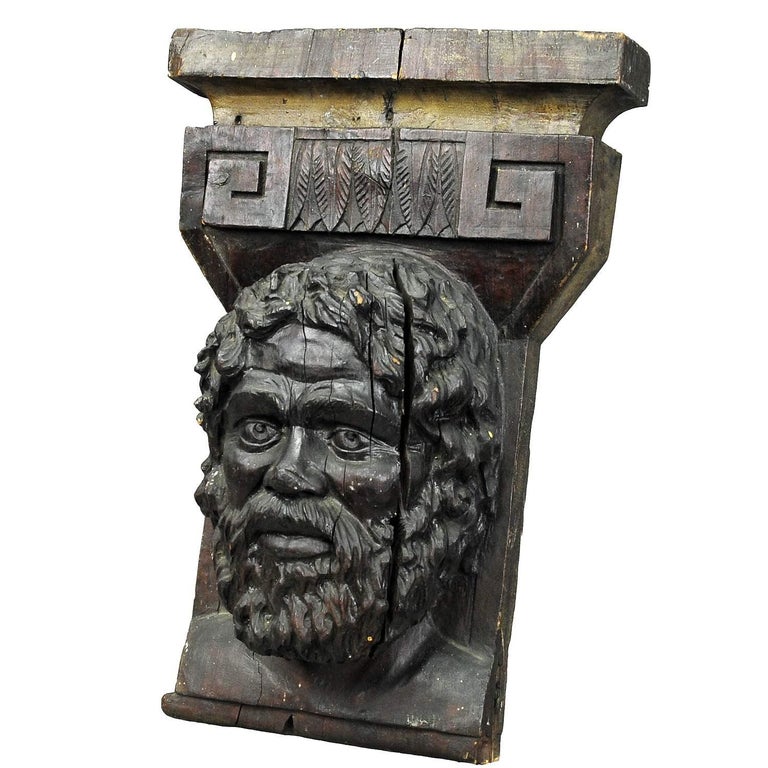 Highly detailed antique sculpture of a male face. Impressive wall decoration. Hand carved and stained wood.

Measures: Width 13.78
