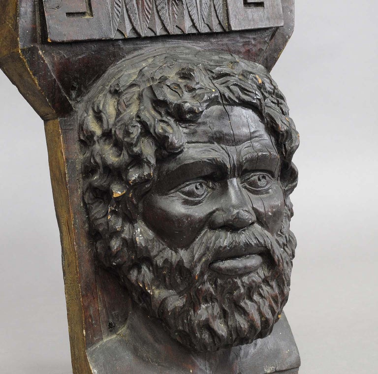 German Wooden Sculpture of a Masculine Face For Sale
