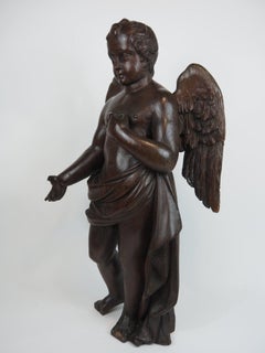 Wooden sculpture of a putto, mix of baroque and classical style, Early 19th c.