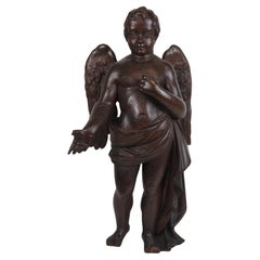 Wooden sculpture of a putto, mix of baroque and classical style, Early 19th c.