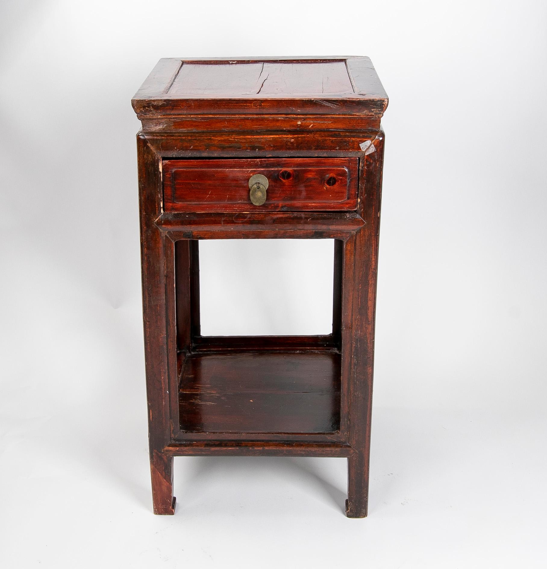 Wooden side table with drawer and inlaid front.