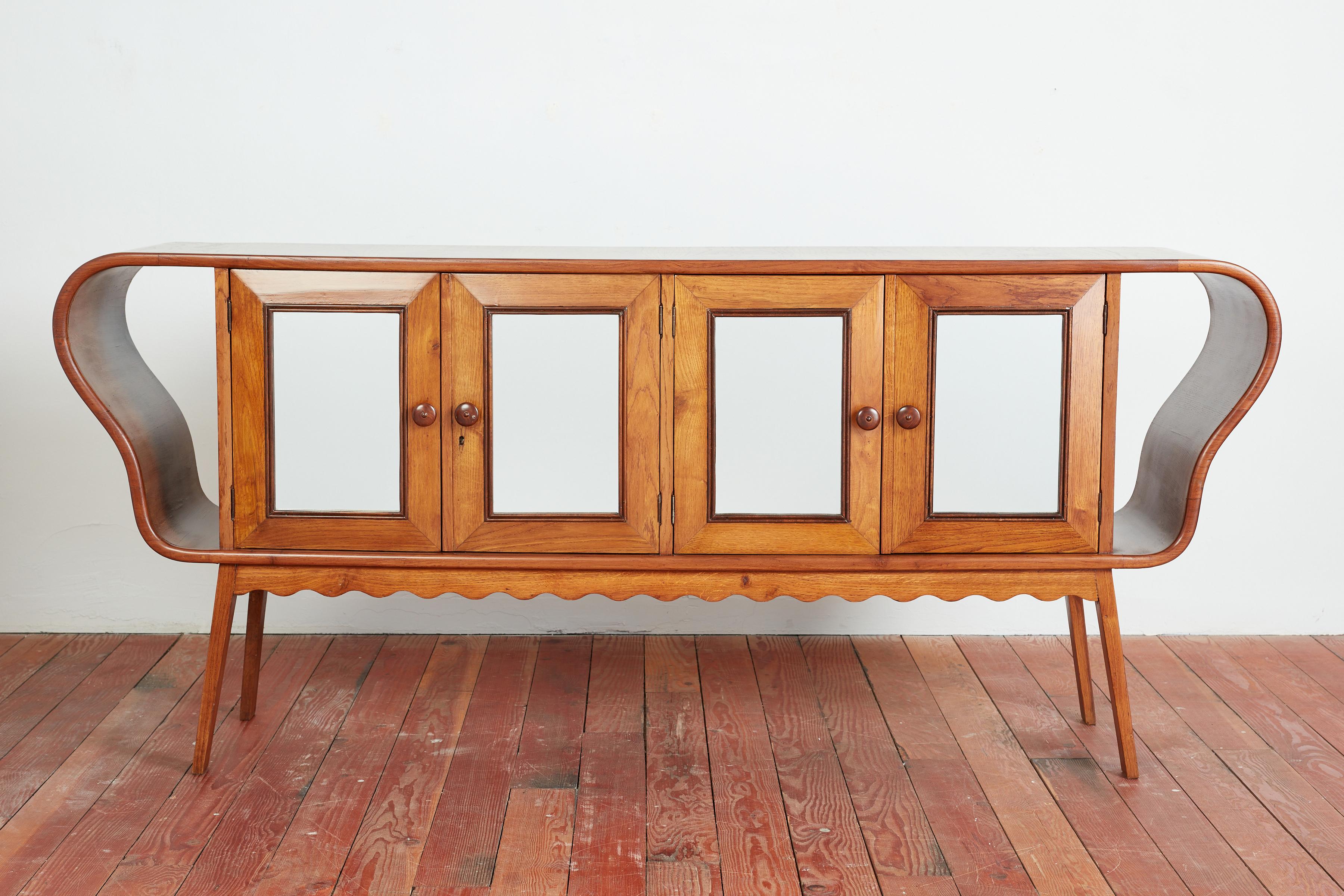 Incredibly rare sideboard by Gustavo Pulitzer - 
Italy 1950's 
A signed piece with open curved 