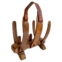 Porte-revues squelettes squelettique en bois de style Jacques Adnet
