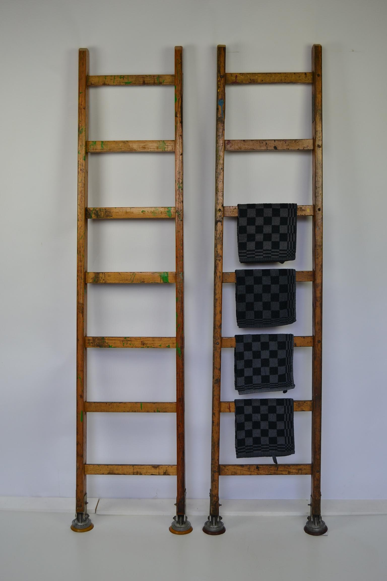 Great looking aged wooden ladders
made by the H.C Slingsby Ltd Company - London - UK.
This English Company is known for making trucks, ladders, barrows, castors ...
These old wooden ladders have cup rubber suction feet to place the ladder in the