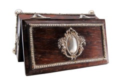 Wooden stamp box with silver applications on the casing and hinged lid