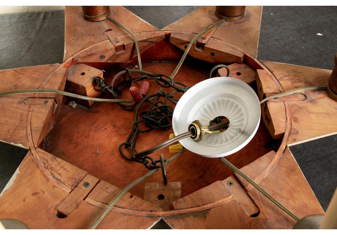 Patinated Wooden Star Form Chandelier For Sale