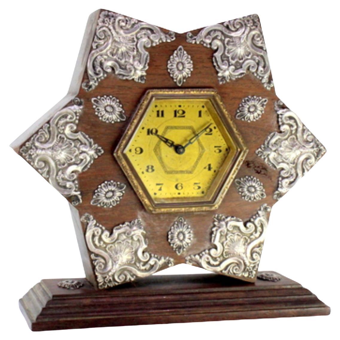 Wooden star-shaped regulator clock with silver applications