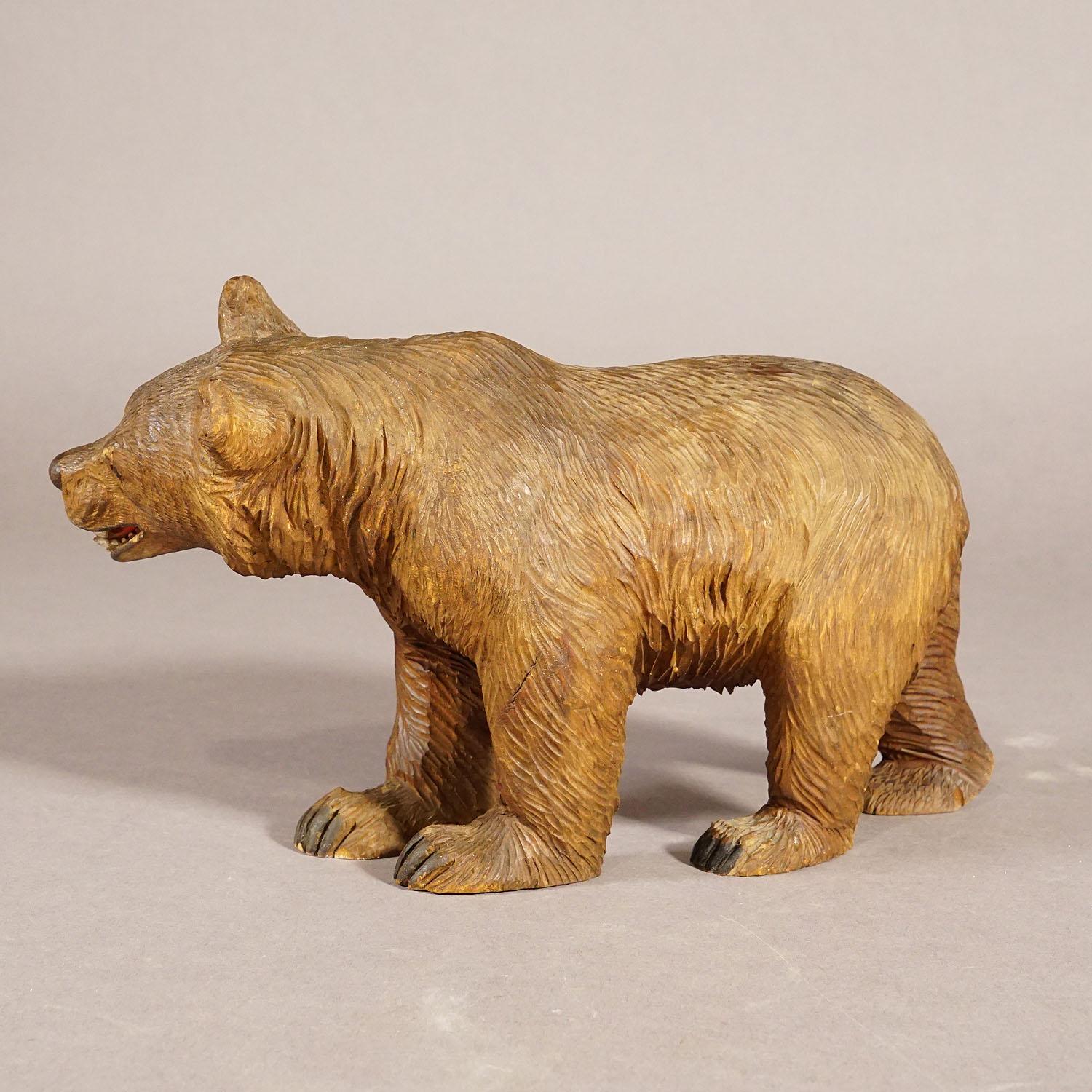 Swiss Wooden Statue of a Walking Bear Hand Carved in Switzerland, circa 1930s For Sale