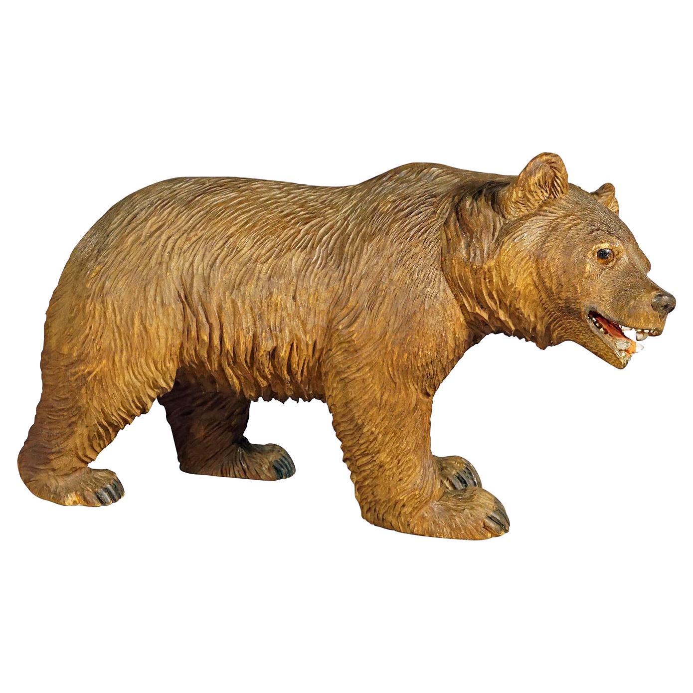 Wooden Statue of a Walking Bear Hand Carved in Switzerland, circa 1930s For Sale