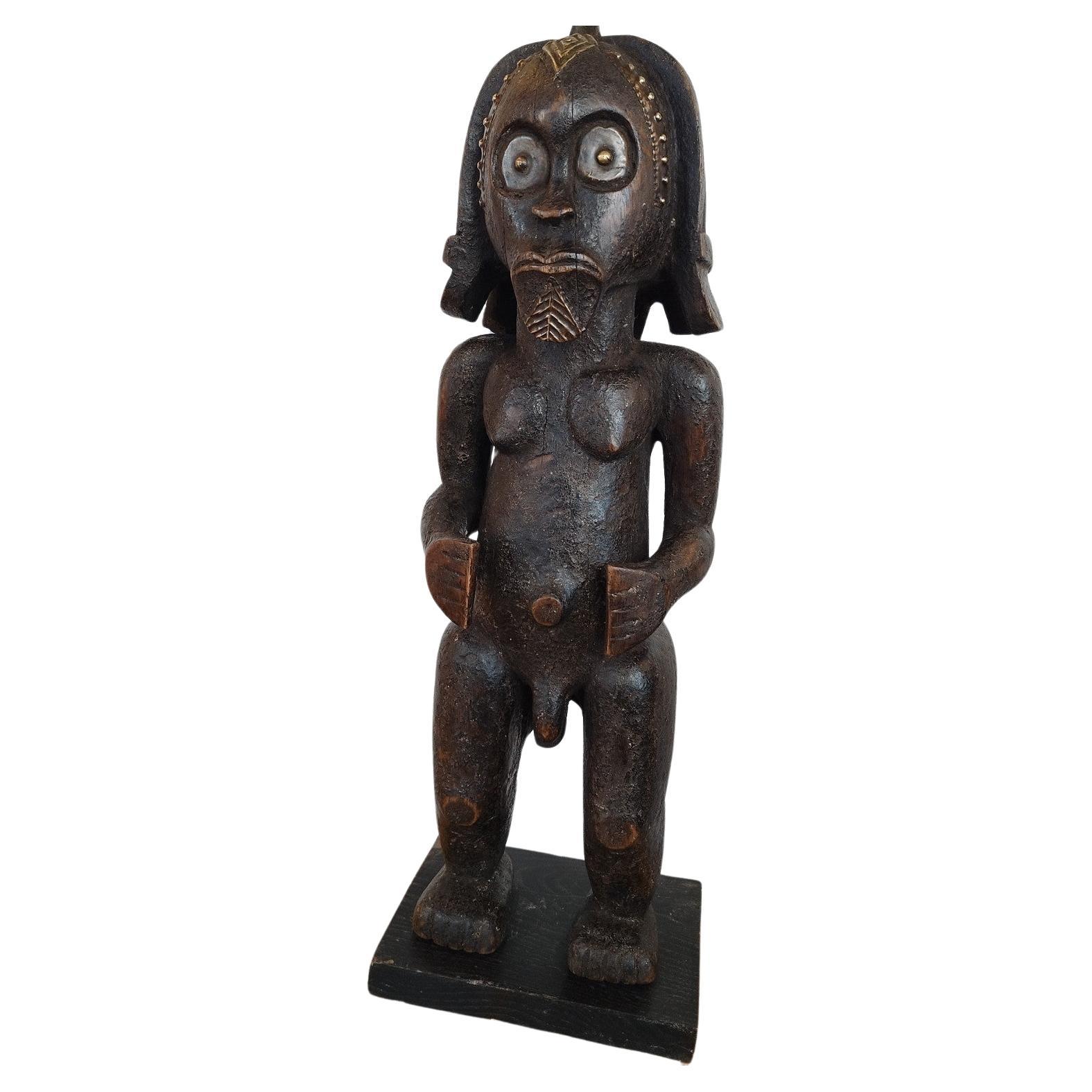 Wooden statue of a warrior For Sale