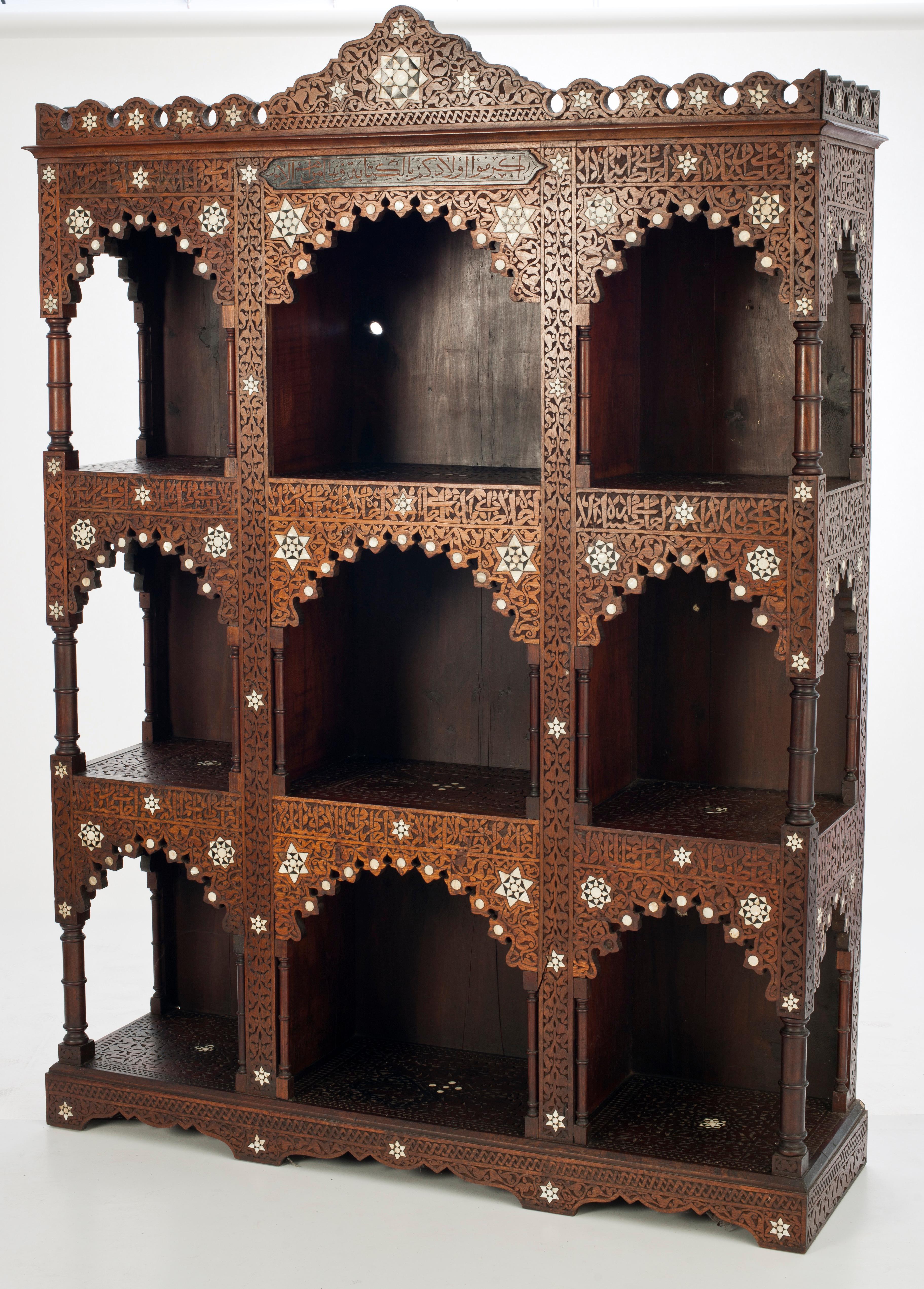 Very rare 19th century wall unit from Syria (Damascus), circa 1870. This Fine piece features intricate mother of pearl inlay. The entire wall unit is handcut and hand engraved. From the private collection of Guy Brunton.

Guy Brunton OBE (order of