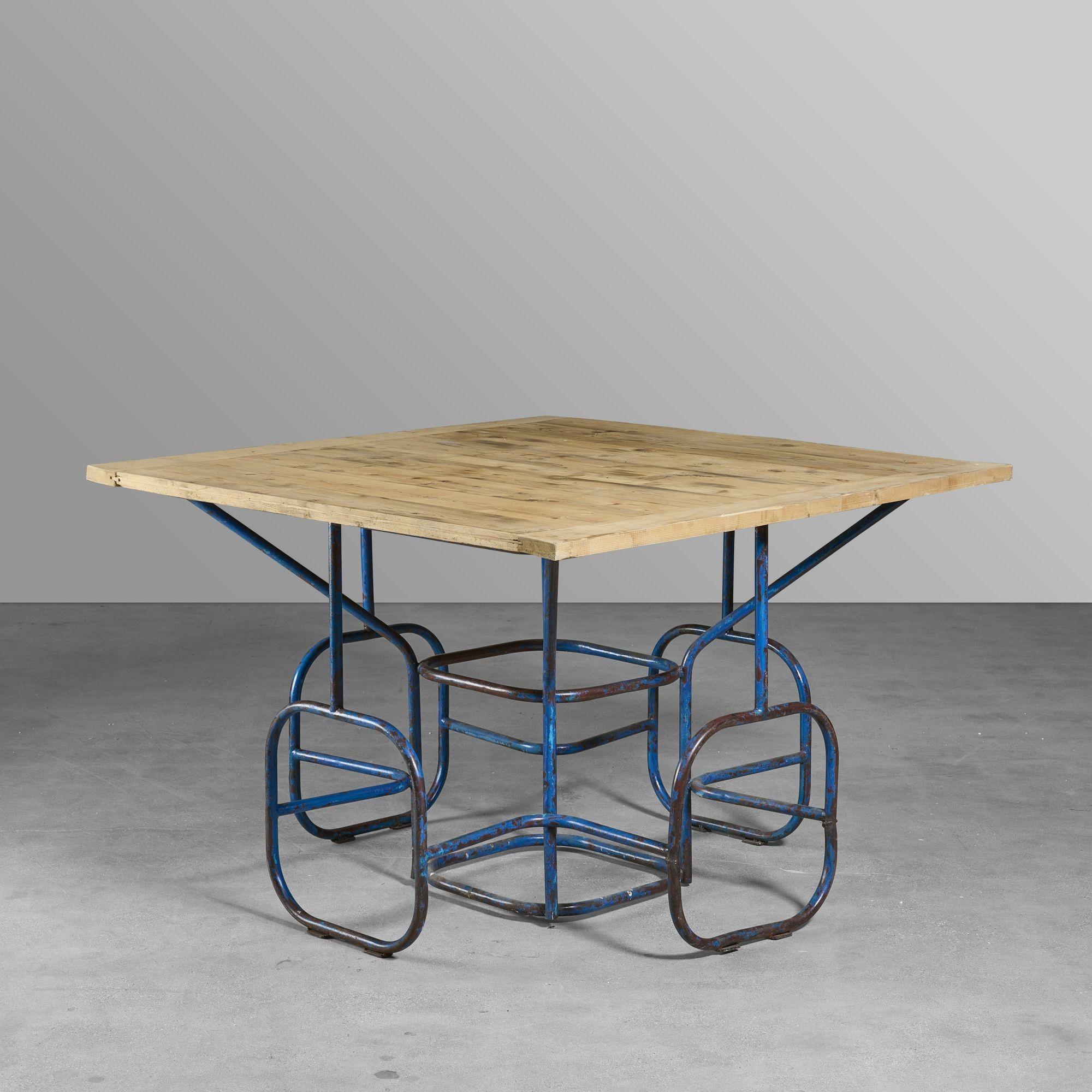 Mid century, bent iron table with pine top. Great design and seating configuration.