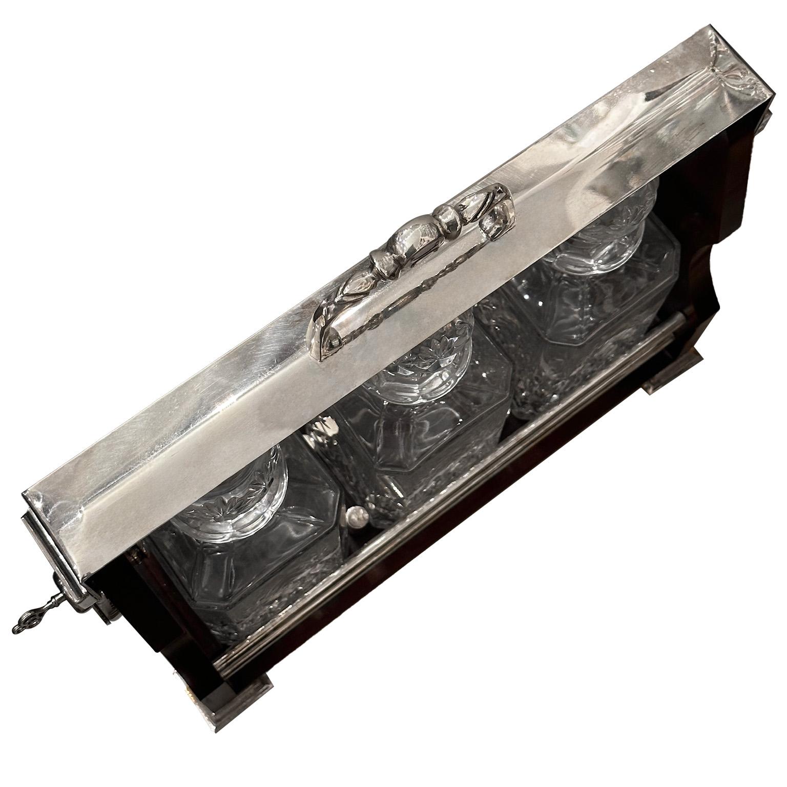 English Tantalus wood silver plate close with a key & 3 Square cut crystal decanters, GB For Sale