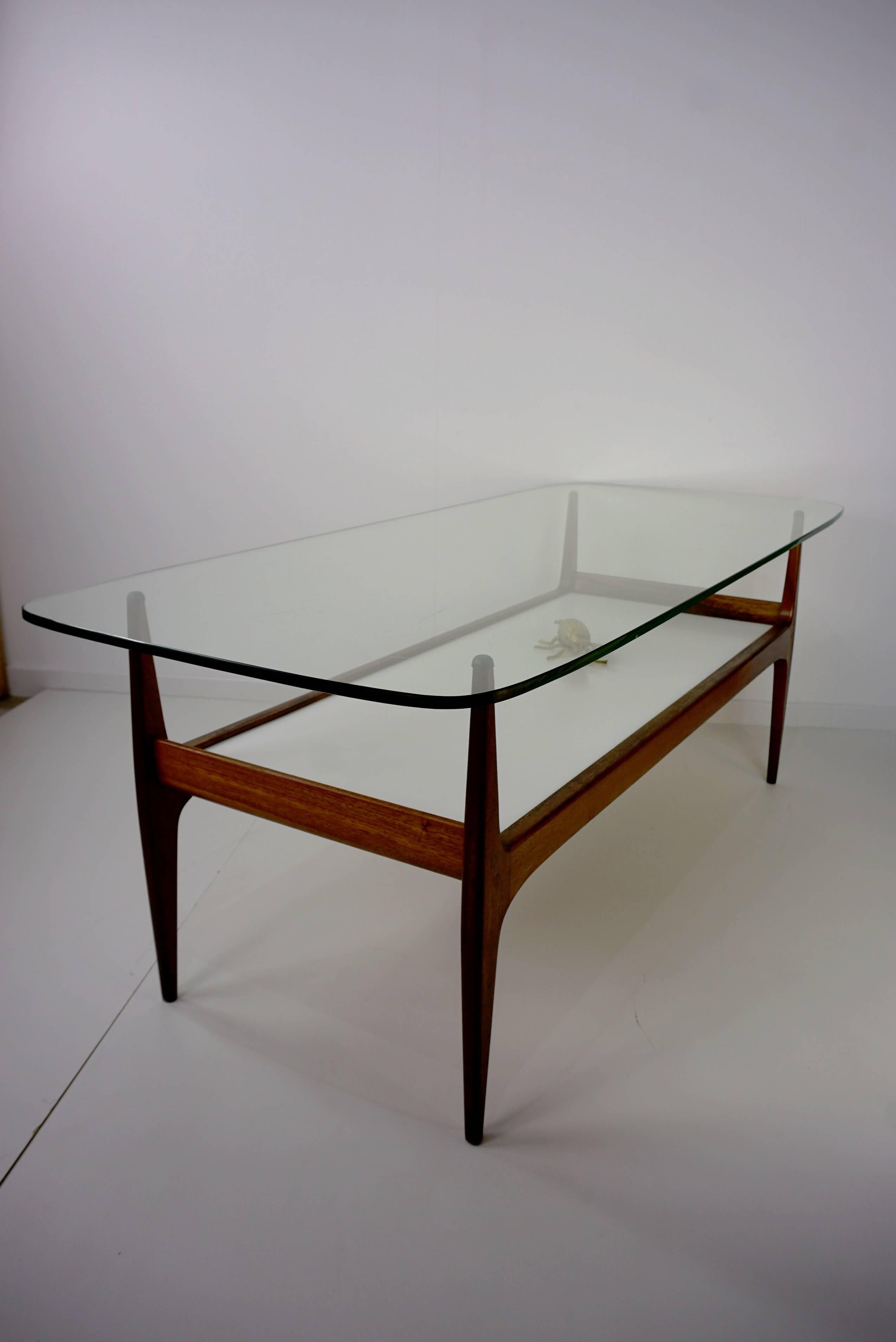 Coffee table from the 1960s white lacquered and wooden teak structure, with a glass top by Jos De Mey, on two levels, beautiful dimensions, aerial and in excellent condition.
 