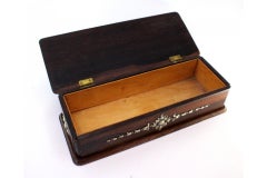 Wooden tie box with silver “Ties” cutout and floral motifs