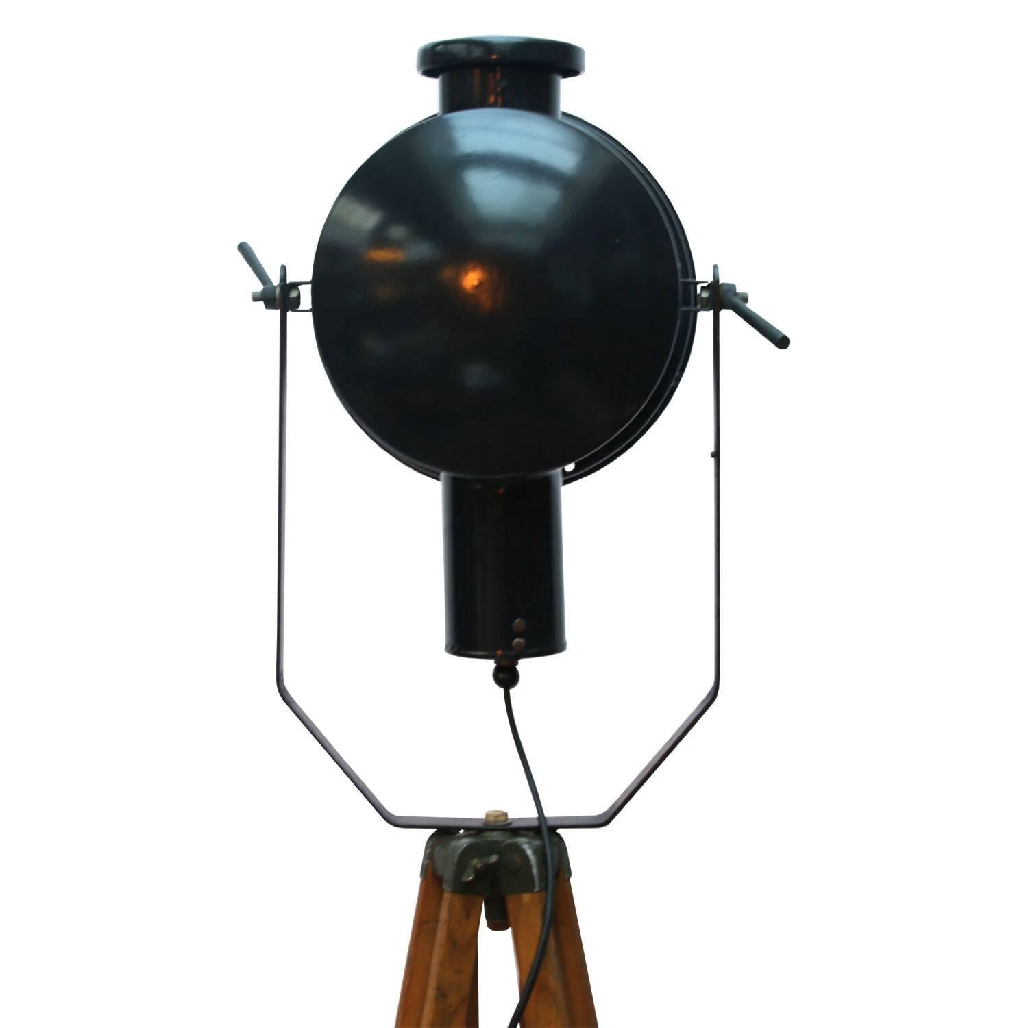 Wooden Tripod Floor Lamp Black Enamel Rounded clear glass Industrial Spot Light In Excellent Condition In Amsterdam, NL