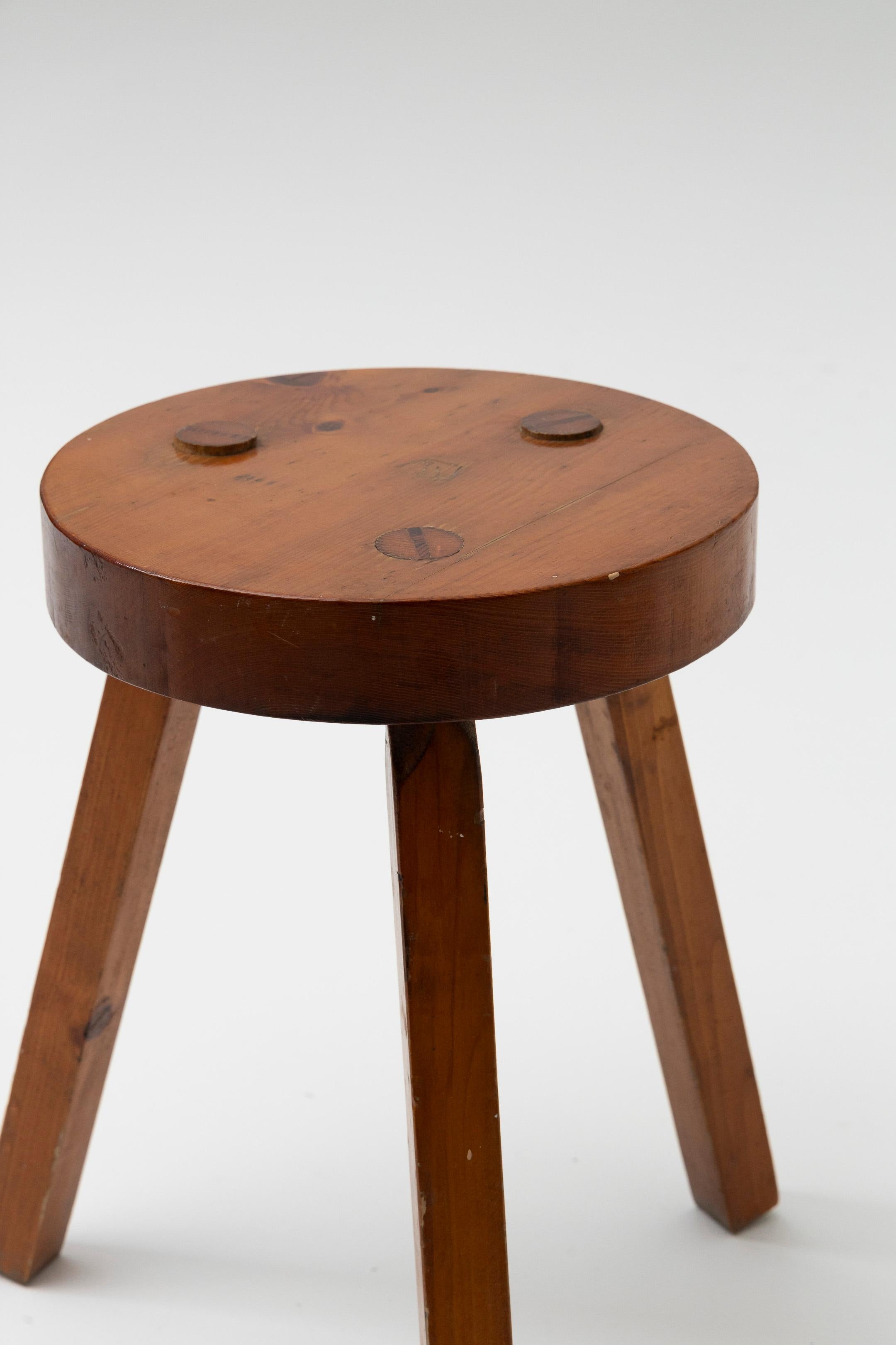 Brutalist wooden tripod stool