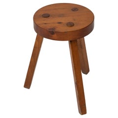 wooden tripod stool