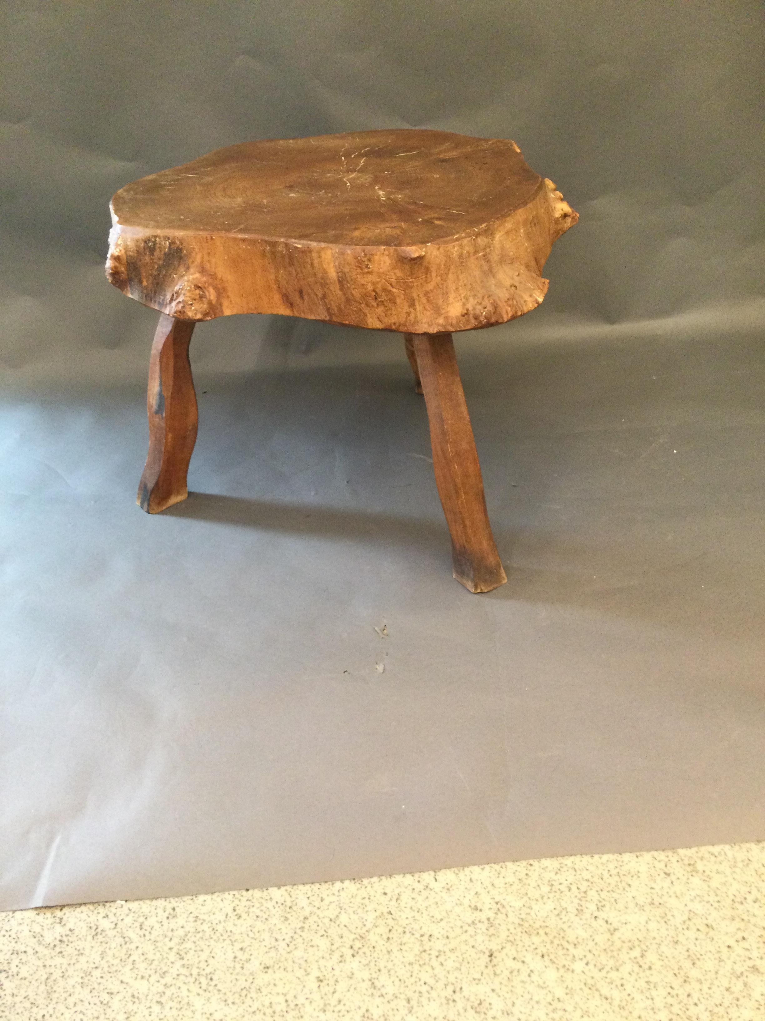 Rare and very beautiful little coffee or side table made out of solid wood and produced in France in the 1960s.
In good vintage condition with some signs and patina from age and use. Stable and good to use the top is ten centimetres thick.