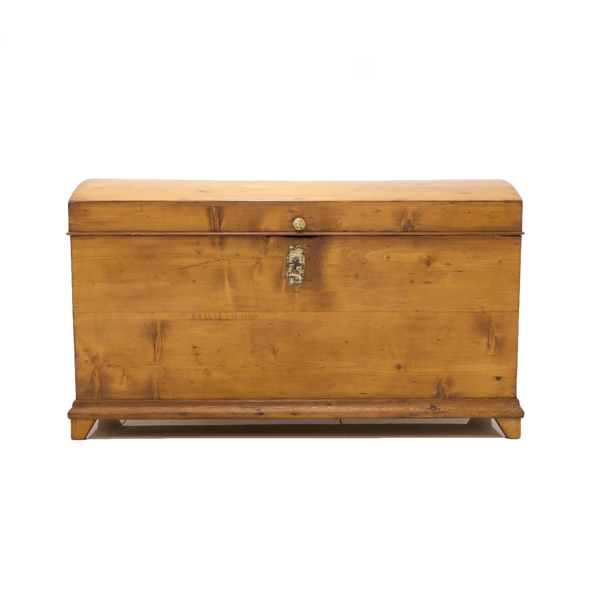 This wooden trunk comes from Poland and was made in 19th century. It is made of spruce wood and has been refinished with natural wax-oil that brought out natural charm and warmth of the wood. It is lockable with a key in original lock and features