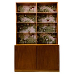Vintage Wooden Unit with Wallpaper Accents