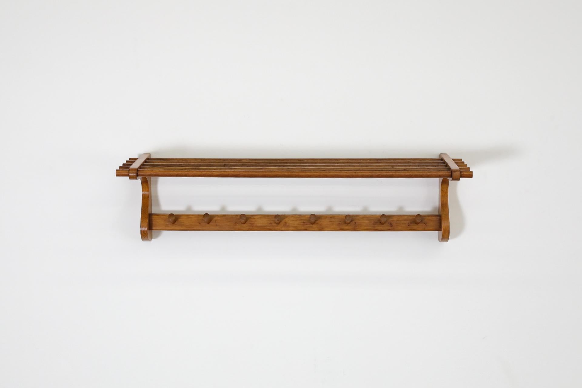 Wooden Wall Mount Coat Rack with Shelf and hooks by 't Spectrum, 1950s In Good Condition For Sale In Los Angeles, CA