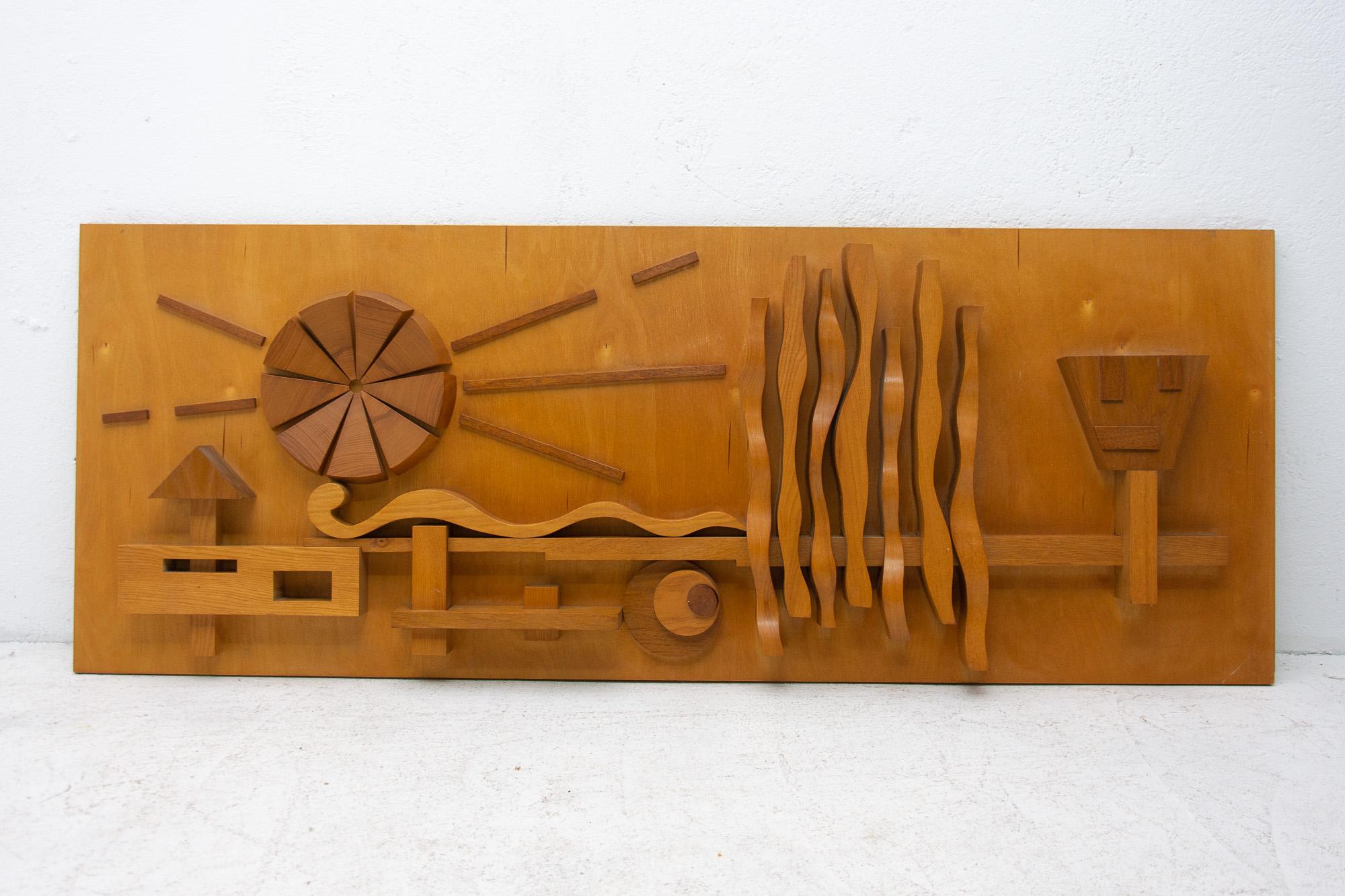 The wooden wall sculpture with the theme of landscape relief comes from one Czechoslovak Hotel and was created in the 1970s. It is a typical example of Czechoslovak design in the communist era of so-called normalization.