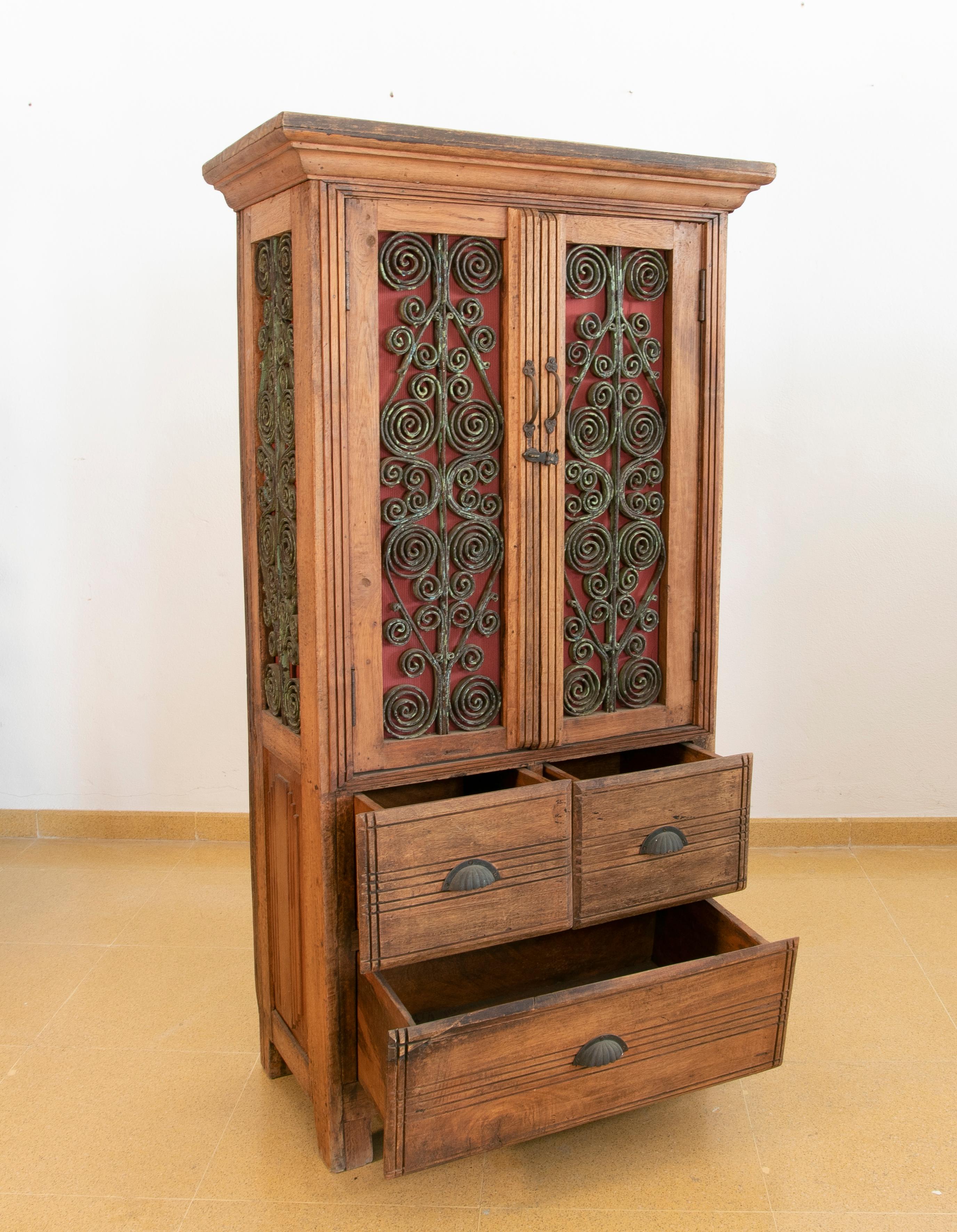 Spanish Wooden Wardrobe with Iron Decorated Doors and Three Drawers For Sale
