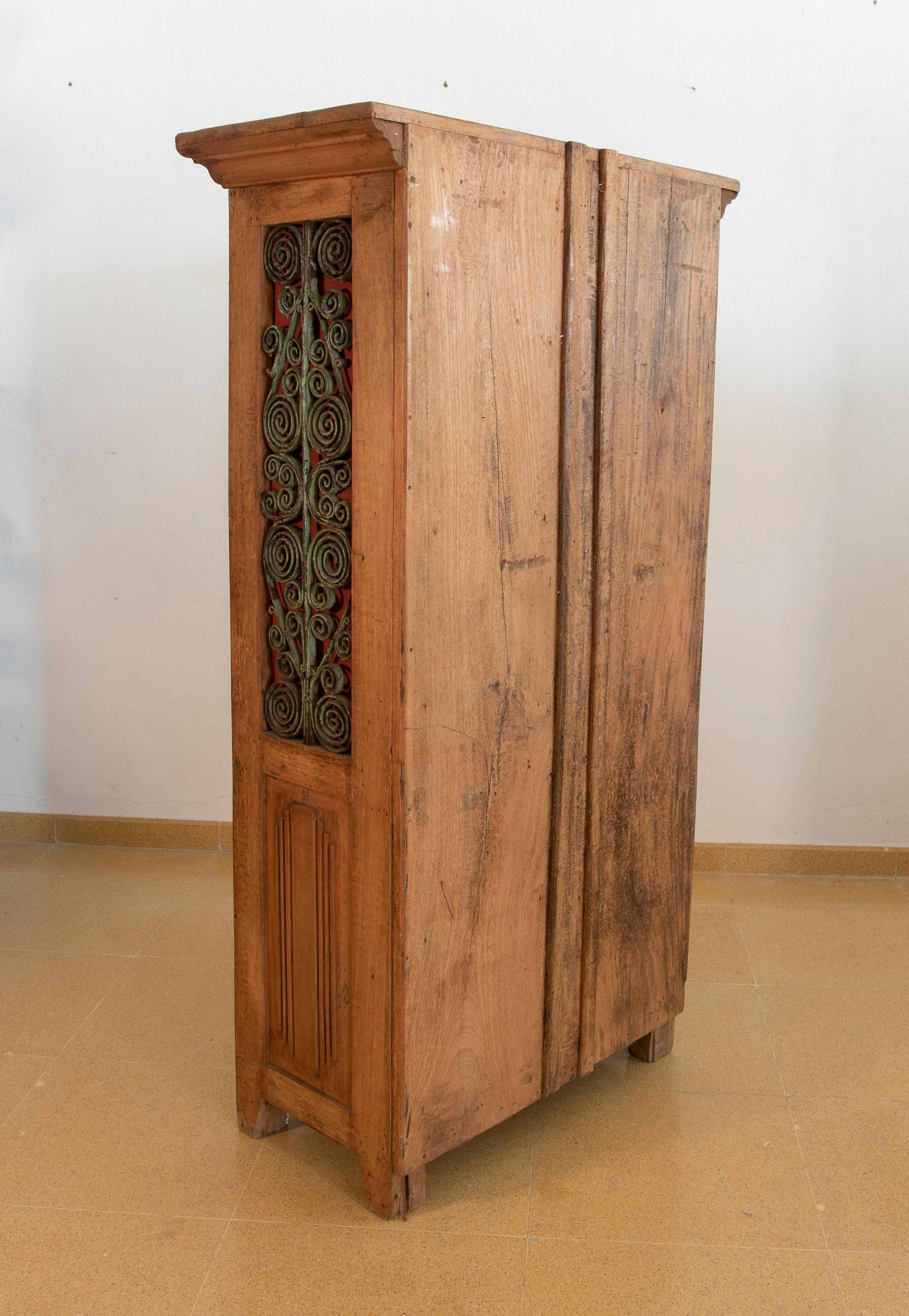 20th Century Wooden Wardrobe with Iron Decorated Doors and Three Drawers For Sale
