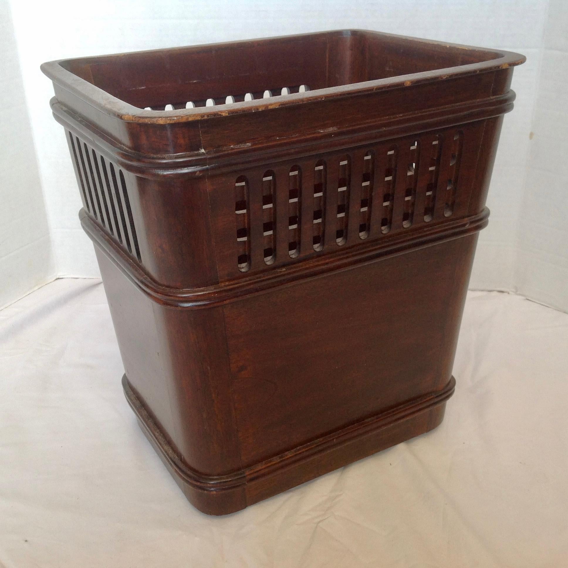 Designed with a lattice like upper half.
Nicely detailed through out with a deep mahogany finish.