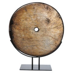 Wooden Wheel on Metal Stand