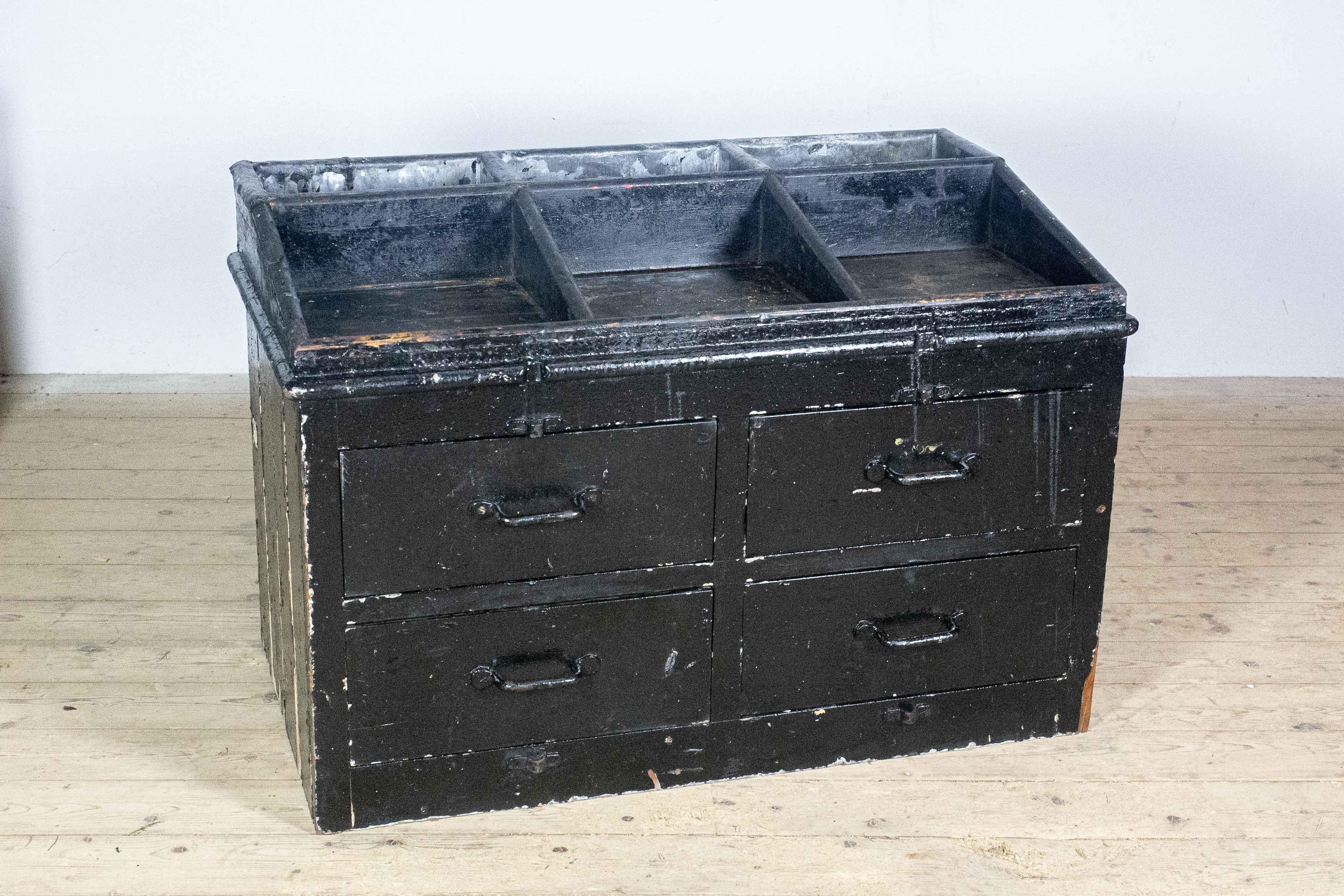 Wooden Workbench from an English Lightship

This unique wooden workbench comes from a former English lightship that once served as a floating lighthouse. It was originally used in the engine room, which explains its distinctive and functional