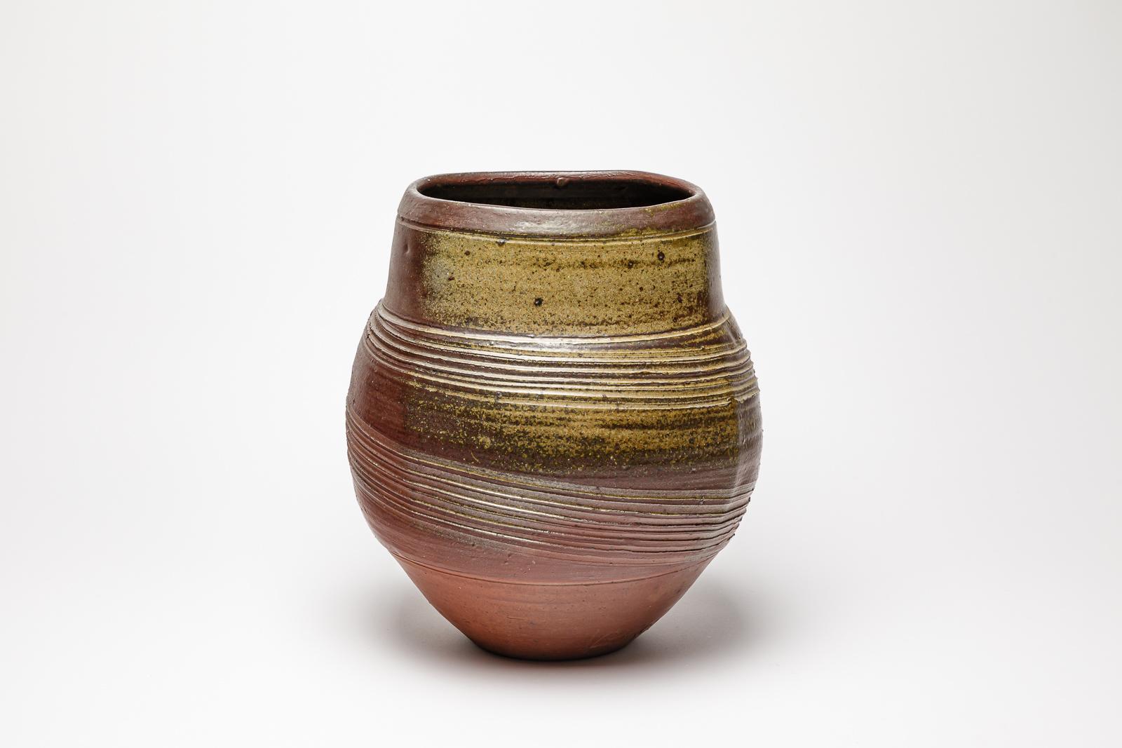 Woodfired ceramic vase by Eric Astoul.
Artist signature under the base. 1987.
H : 12.6’ x 9.8’ inches.