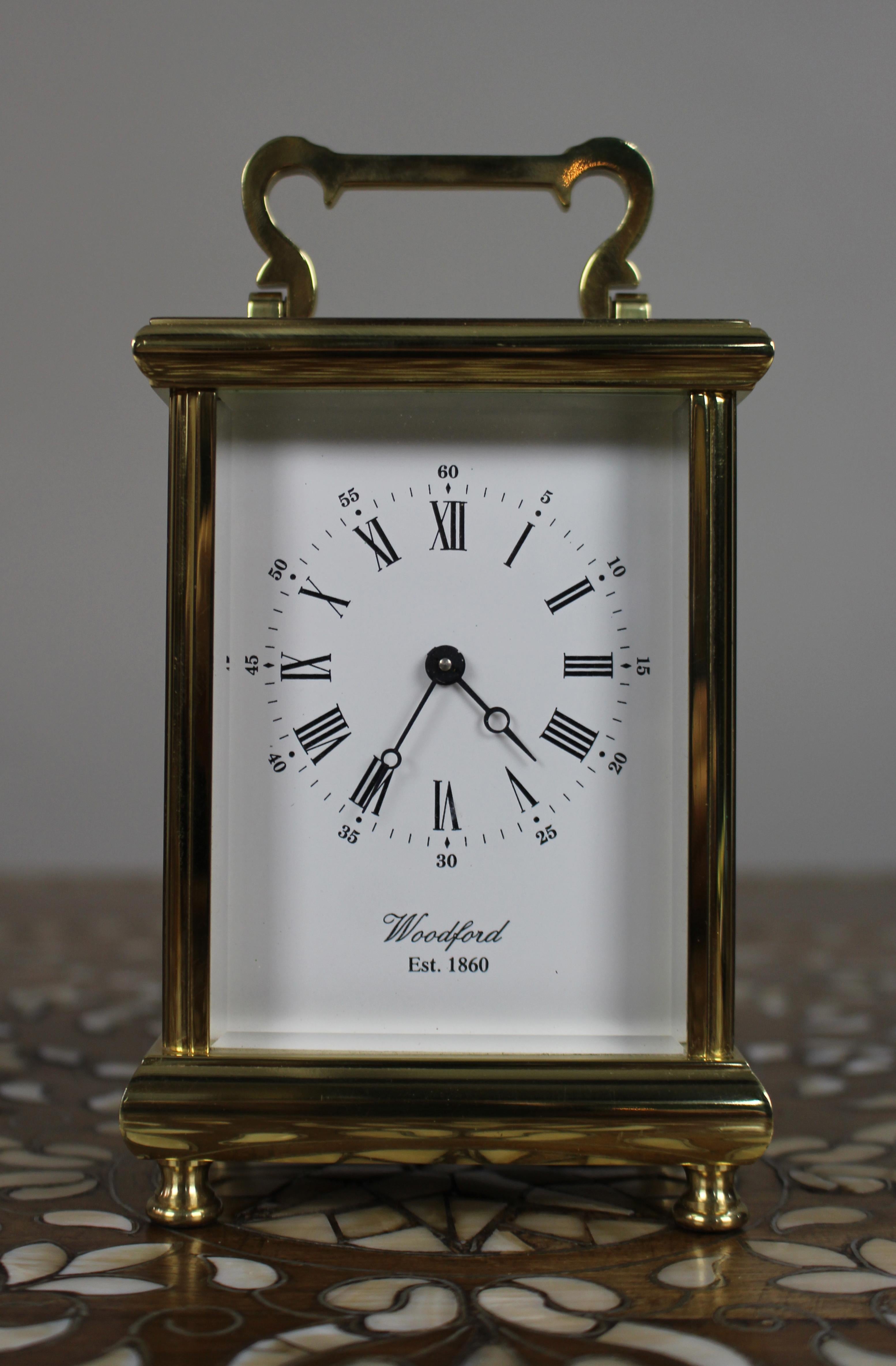 Woodford Brass Carriage Clock, Late 20th Century

A fine late 20th-century brass carriage clock by Woodford (Est. 1860).

Of traditional form, the clock is housed in a polished brass case with bevelled glass panels to all sides, including the top,